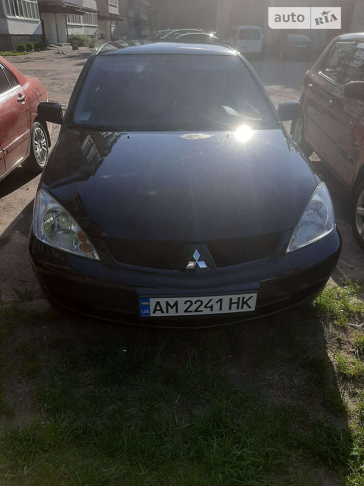 Головне фото звіту автомобіля MITSUBISHI LANCER 2008