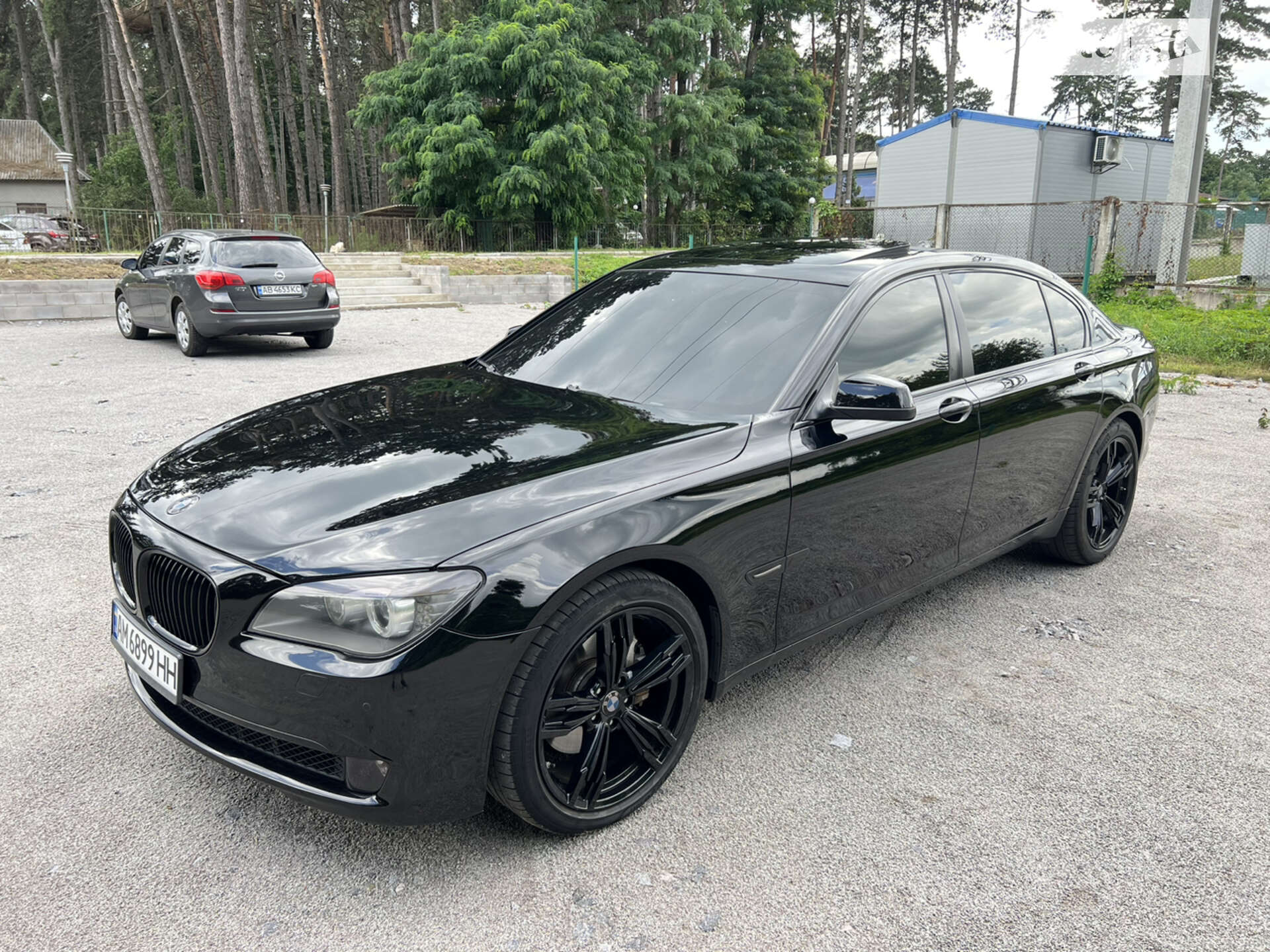 Головне фото звіту автомобіля BMW 740I 2012