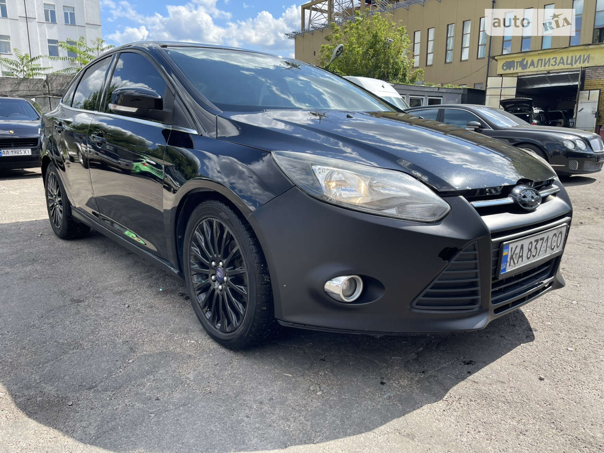 Головне фото звіту автомобіля FORD FOCUS 2012