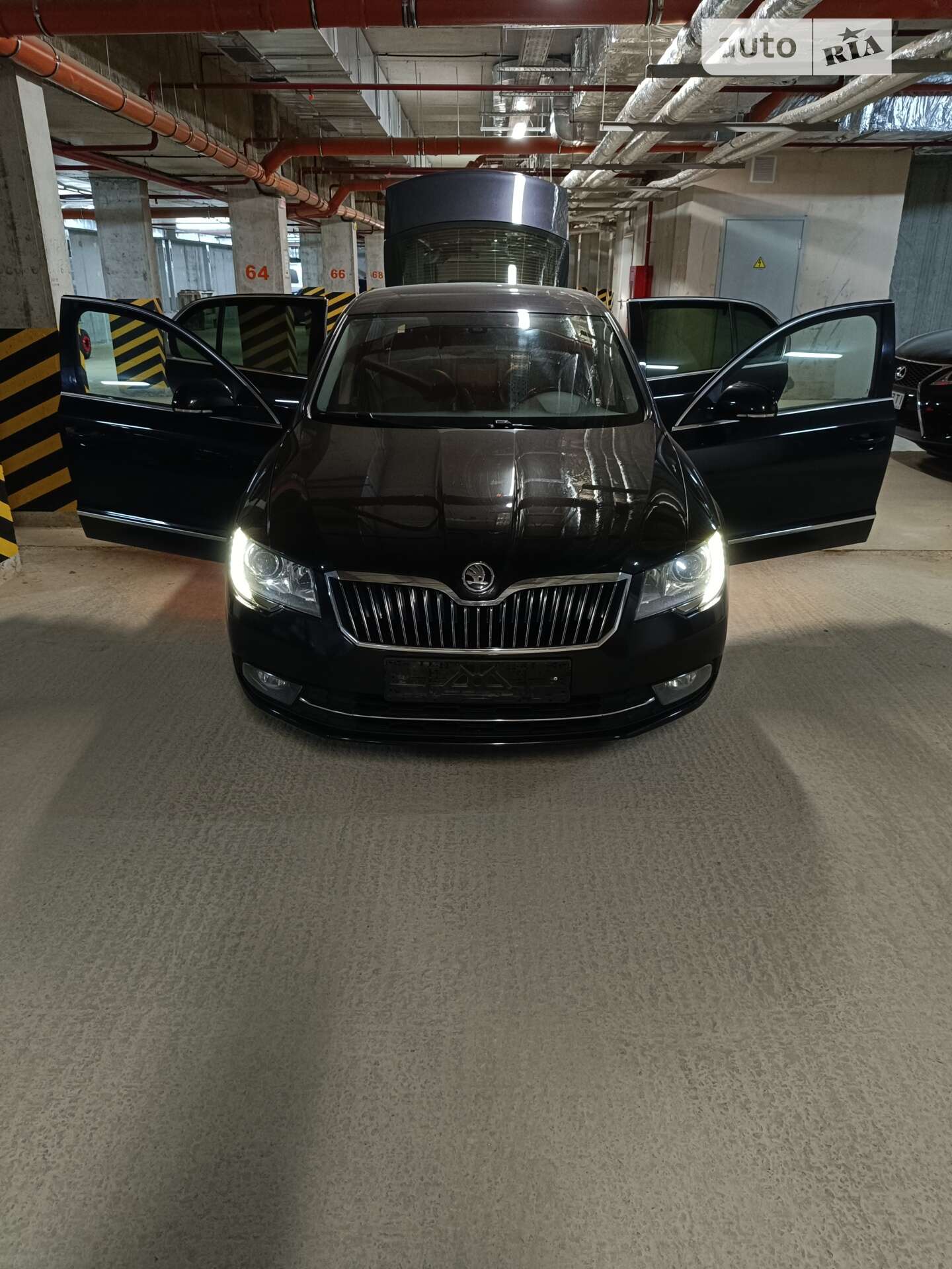 Головне фото звіту автомобіля SKODA SUPERB 2014