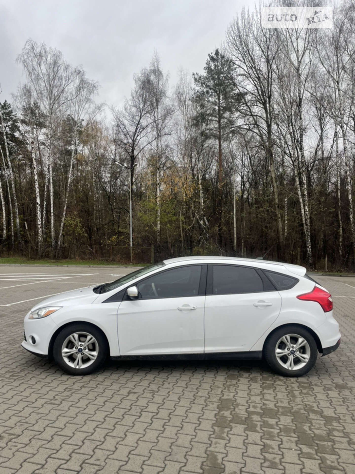 Головне фото звіту автомобіля FORD FOCUS 2014