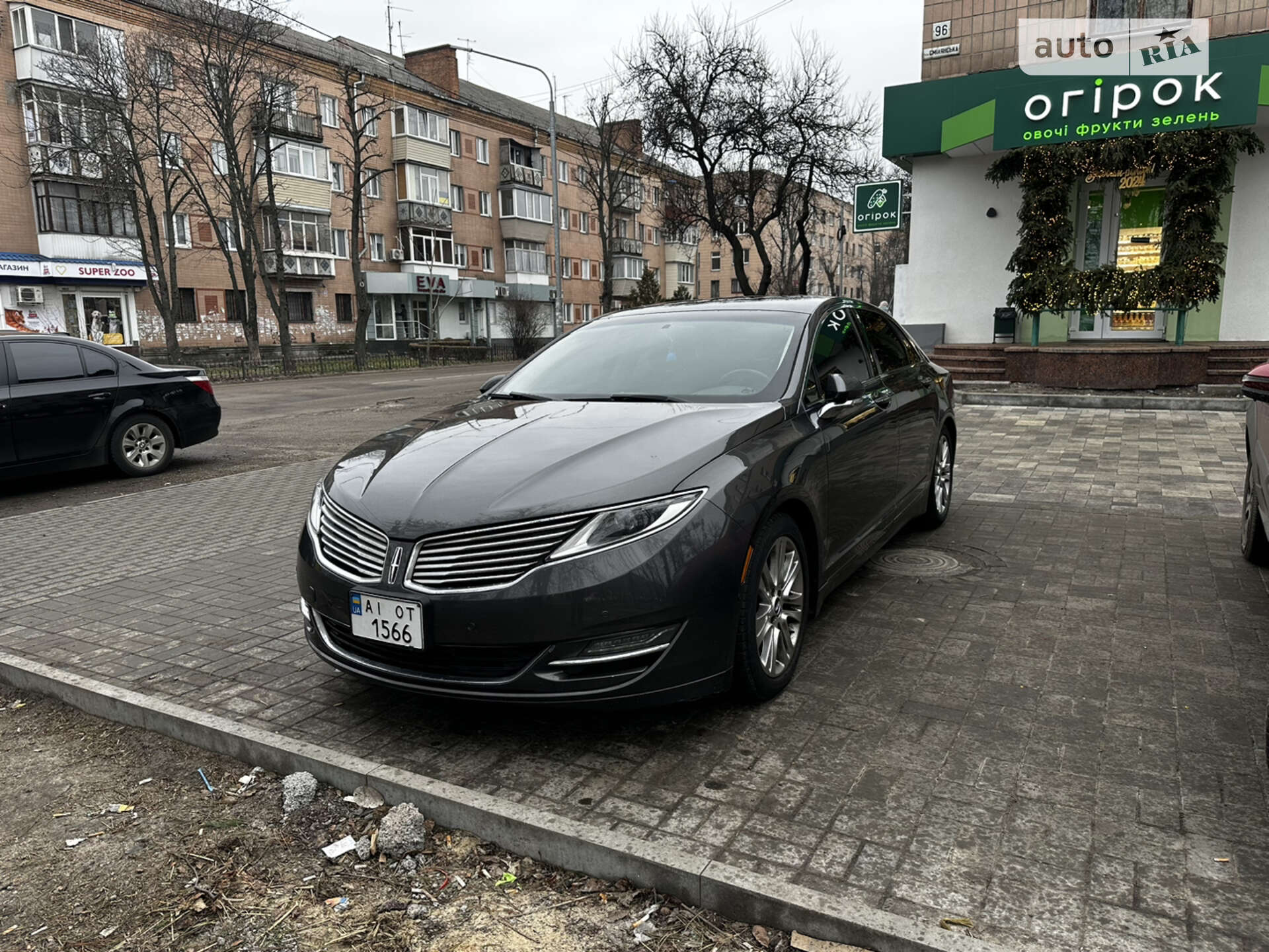 Головне фото звіту автомобіля LINCOLN MKZ 2014