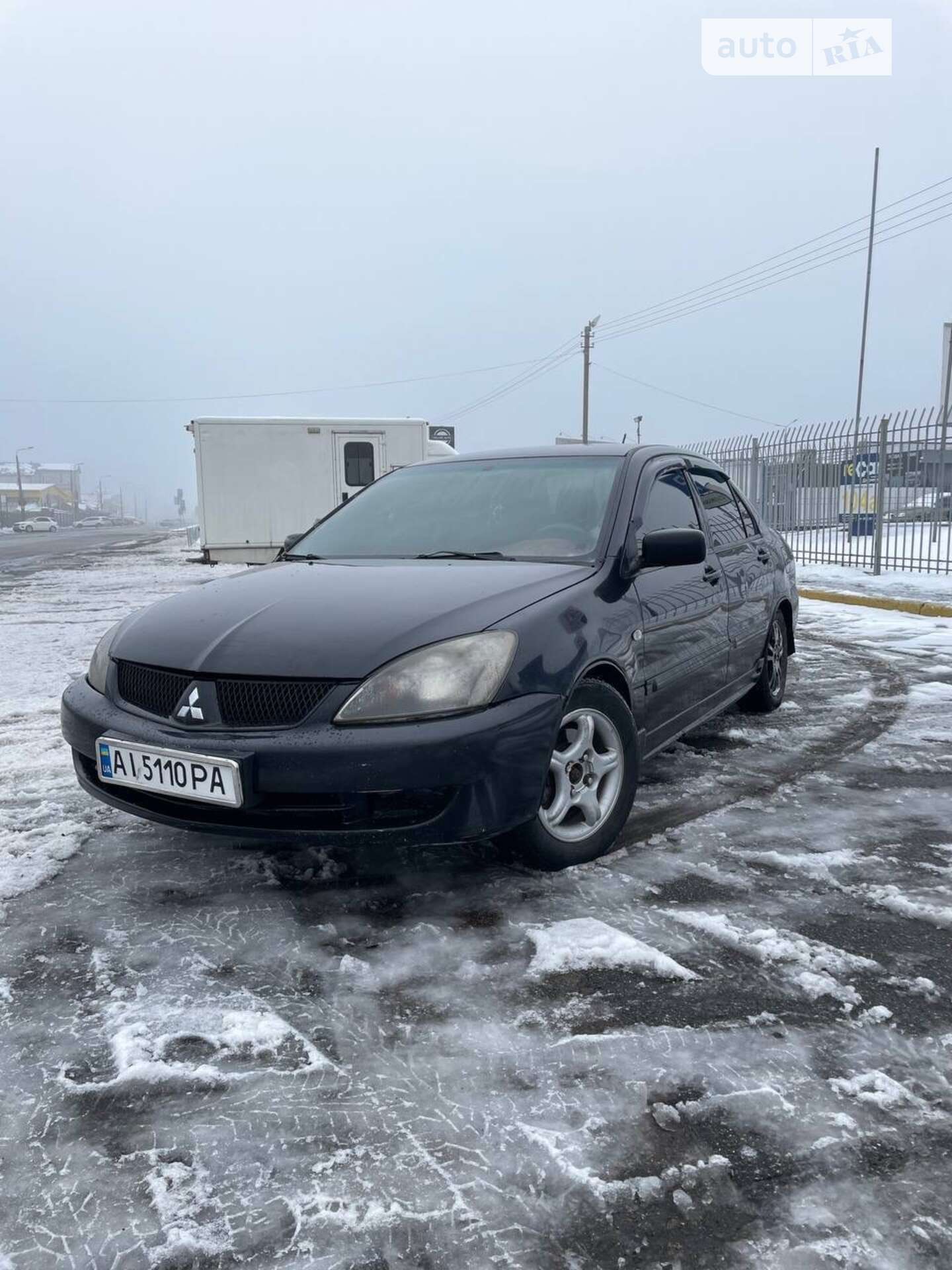 Головне фото звіту автомобіля MITSUBISHI LANCER 2008
