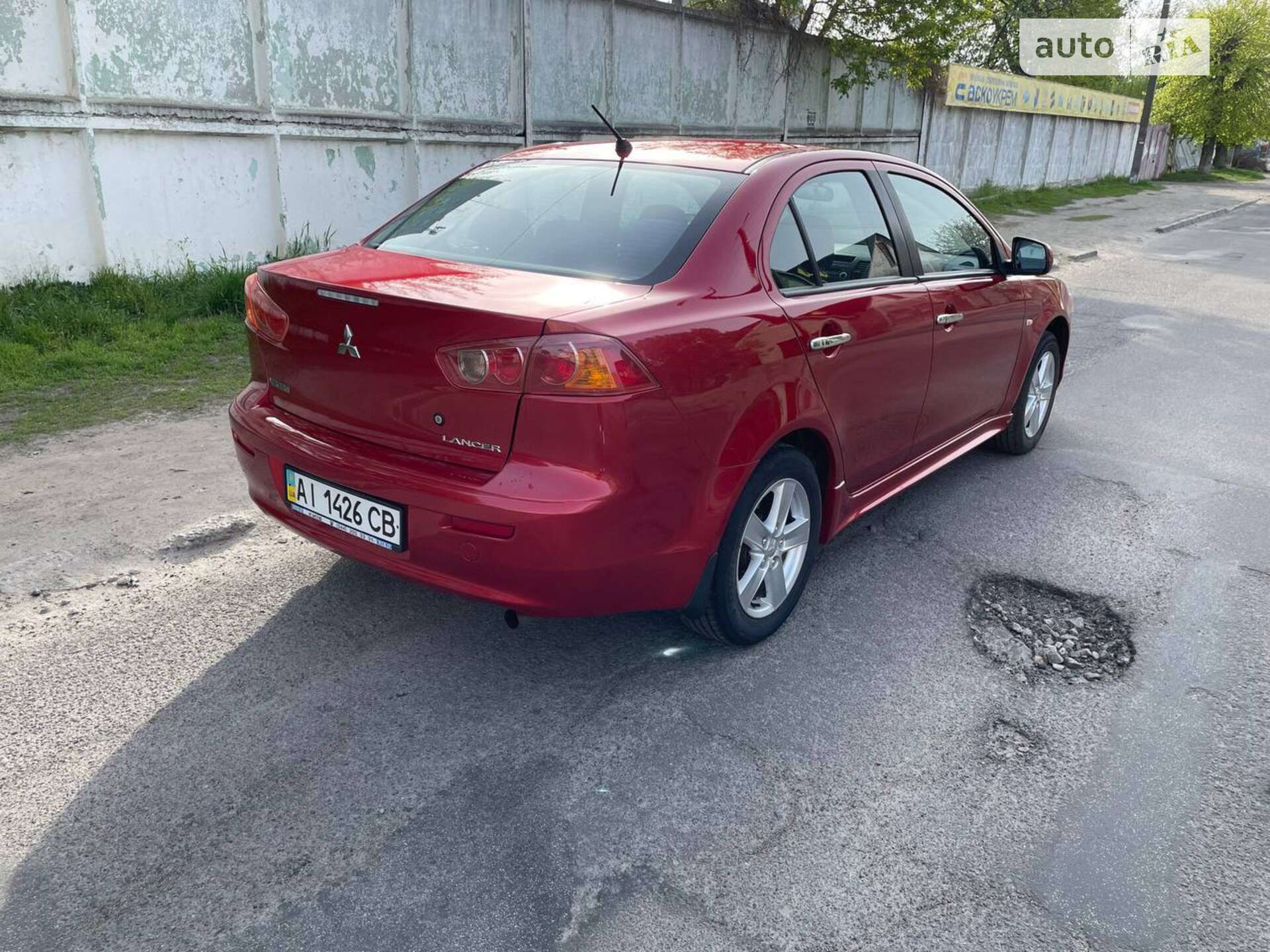 Головне фото звіту автомобіля MITSUBISHI LANCER 2009