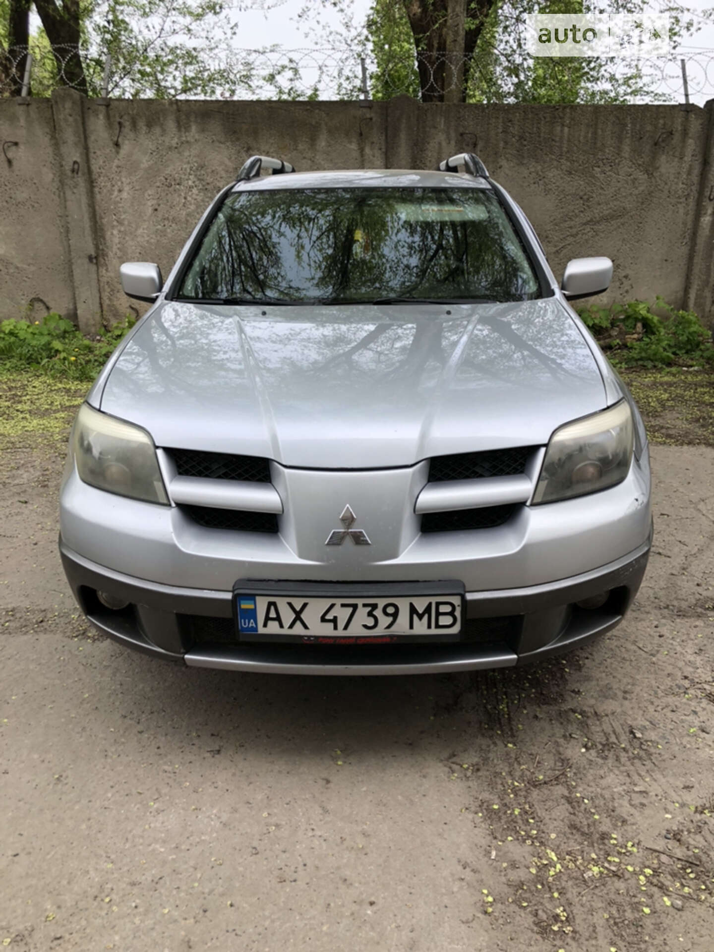 Головне фото звіту автомобіля MITSUBISHI OUTLANDER 2003