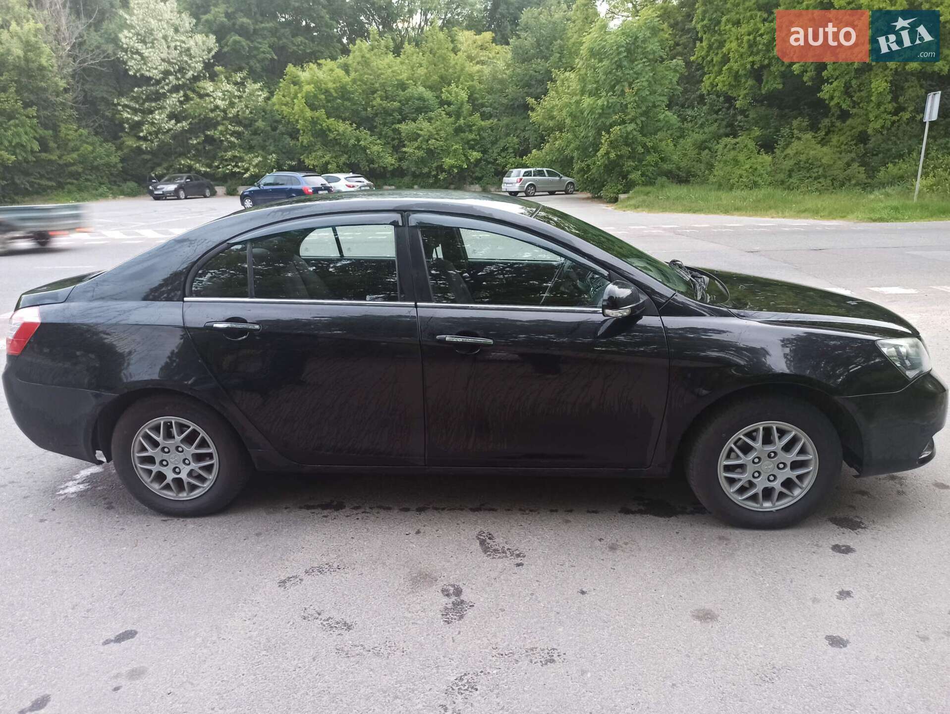 Головне фото звіту автомобіля GEELY EMGRAND 7 2013