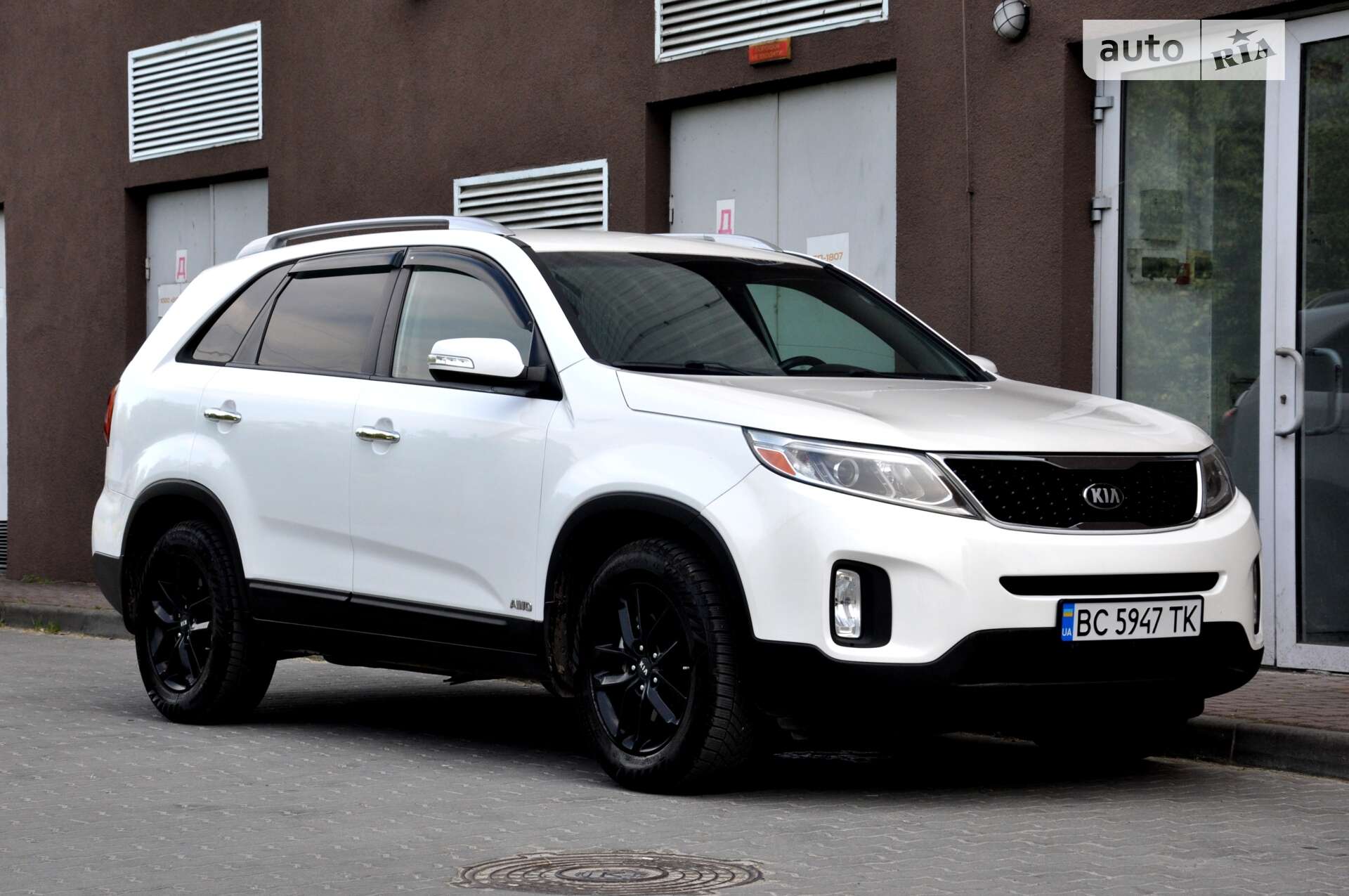 Головне фото звіту автомобіля KIA SORENTO 2013