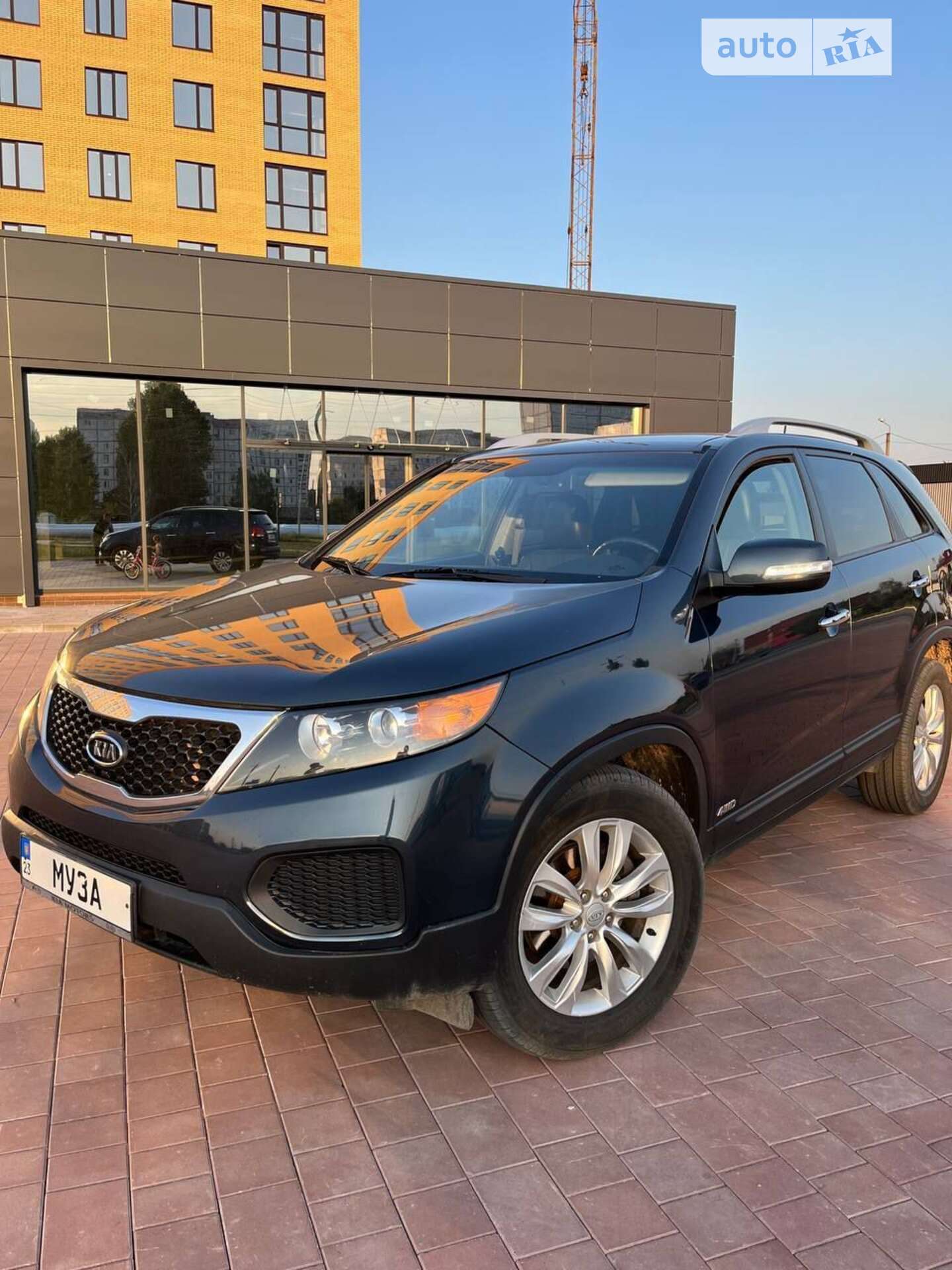 Головне фото звіту автомобіля KIA SORENTO 2009