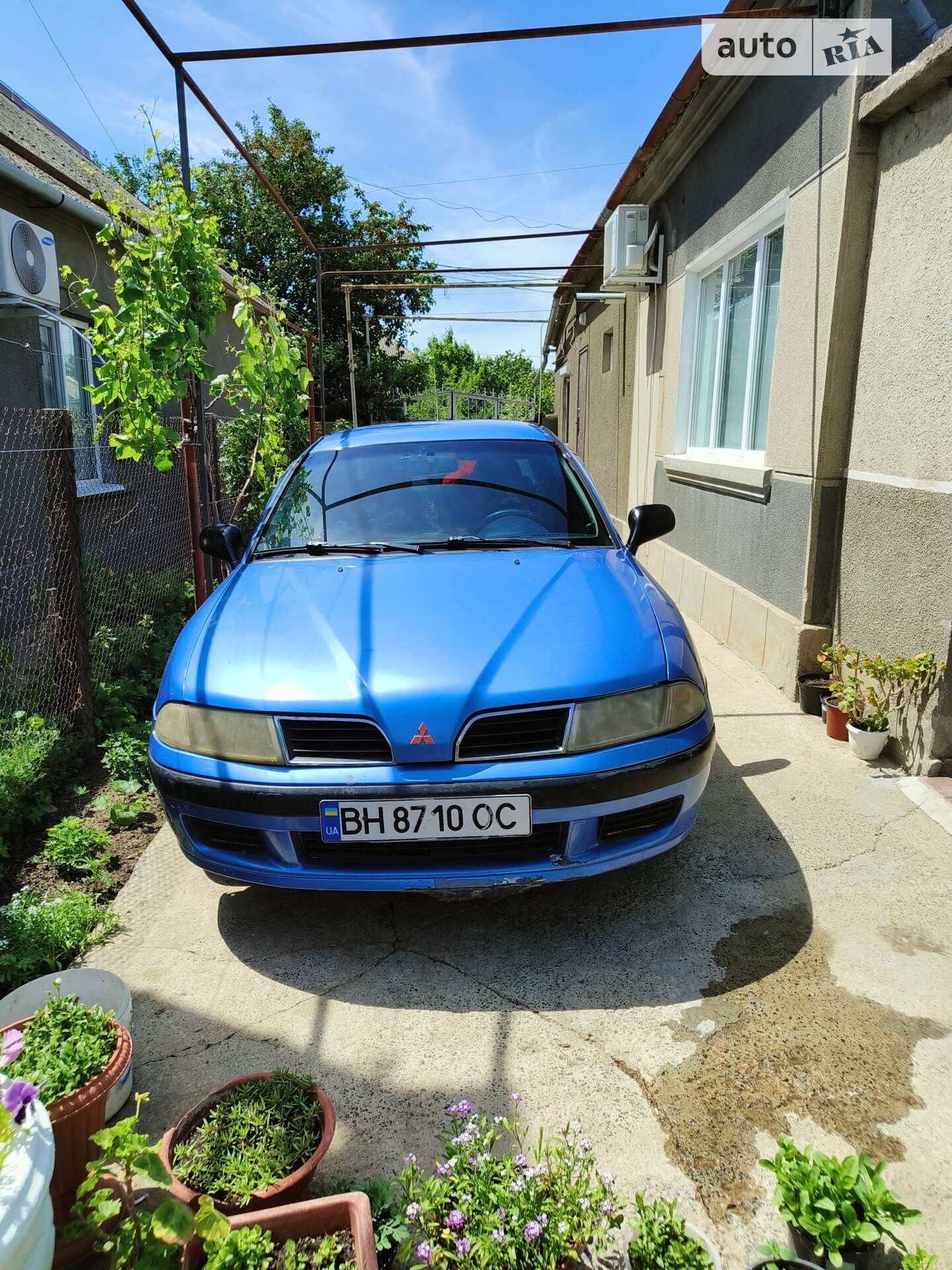 Головне фото звіту автомобіля MITSUBISHI CARISMA 1999