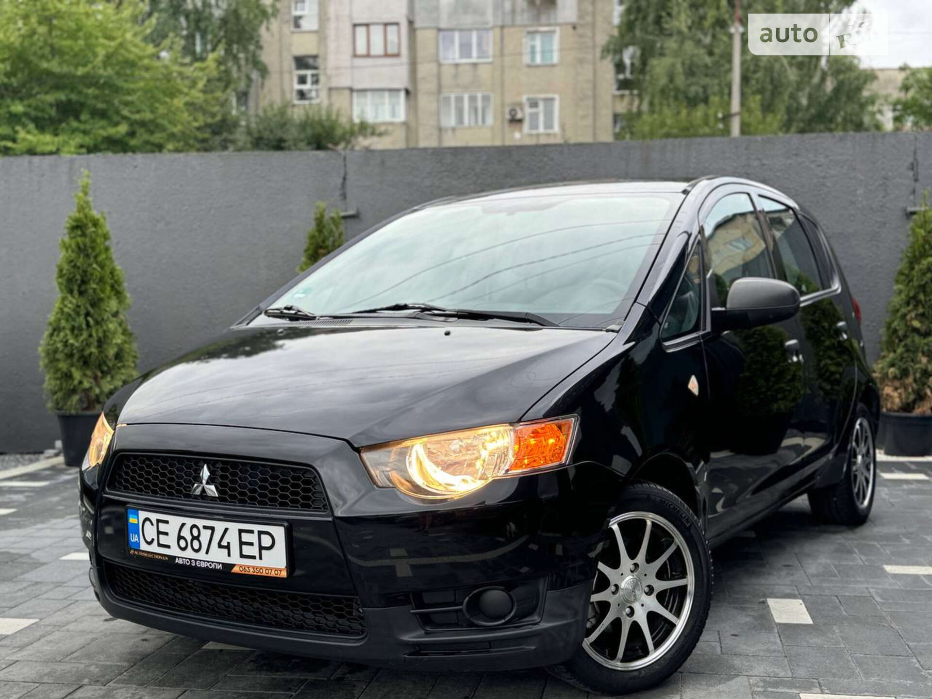 Головне фото звіту автомобіля MITSUBISHI COLT 2009