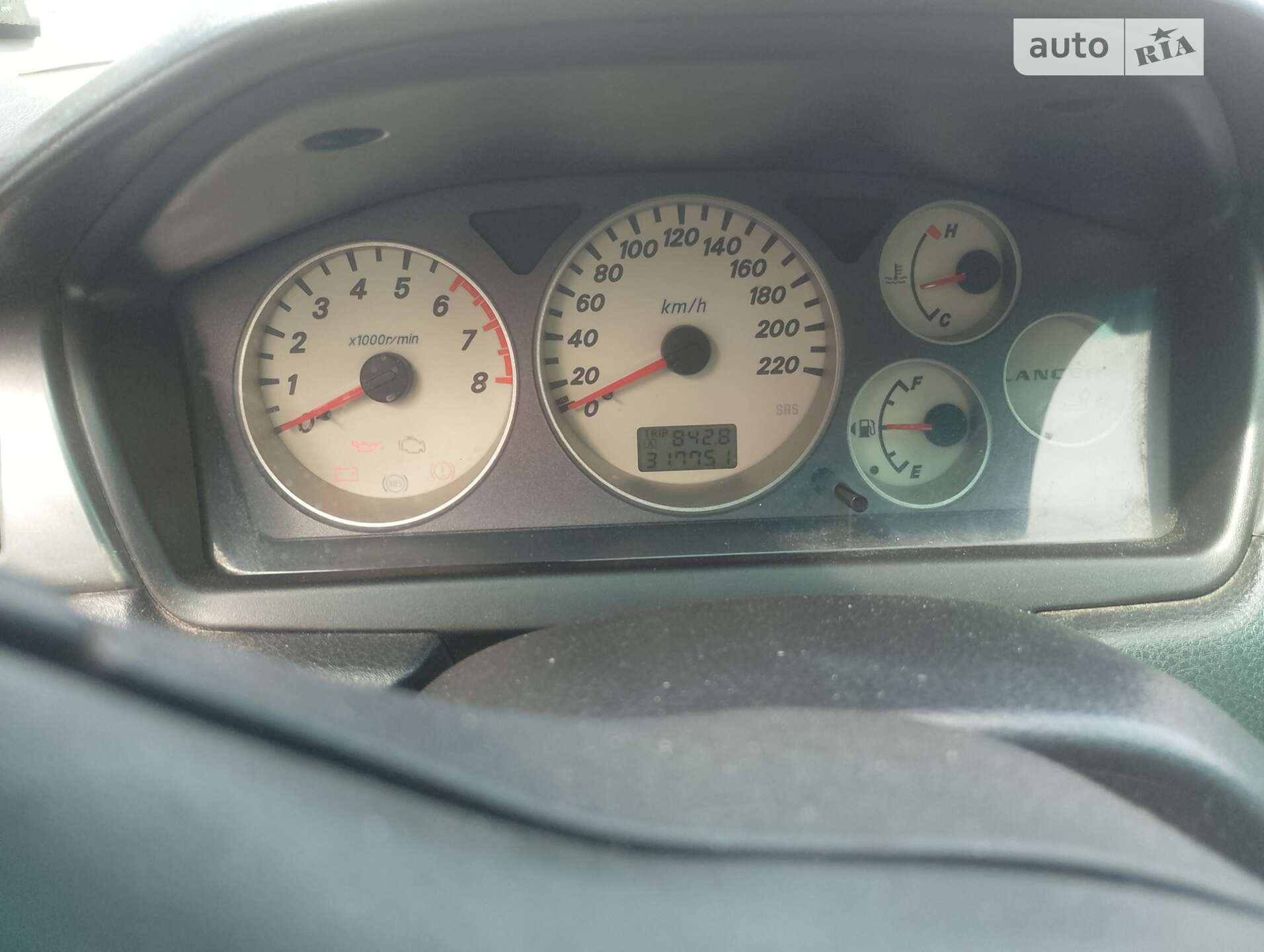 Головне фото звіту автомобіля MITSUBISHI LANCER 2006