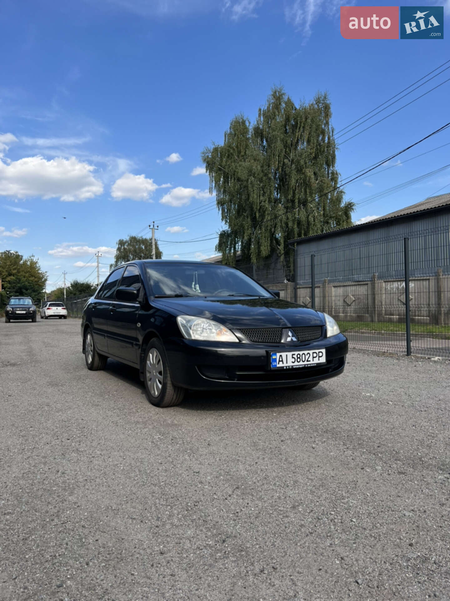 Головне фото звіту автомобіля MITSUBISHI LANCER 2006