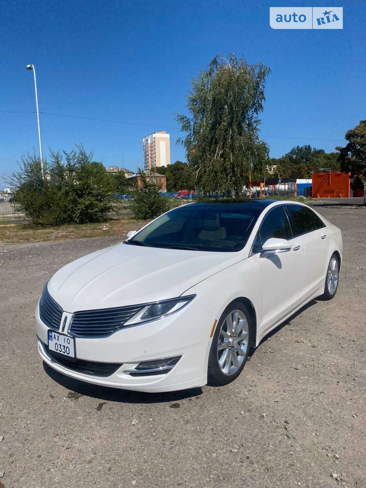 Головне фото звіту автомобіля LINCOLN MKZ 2015