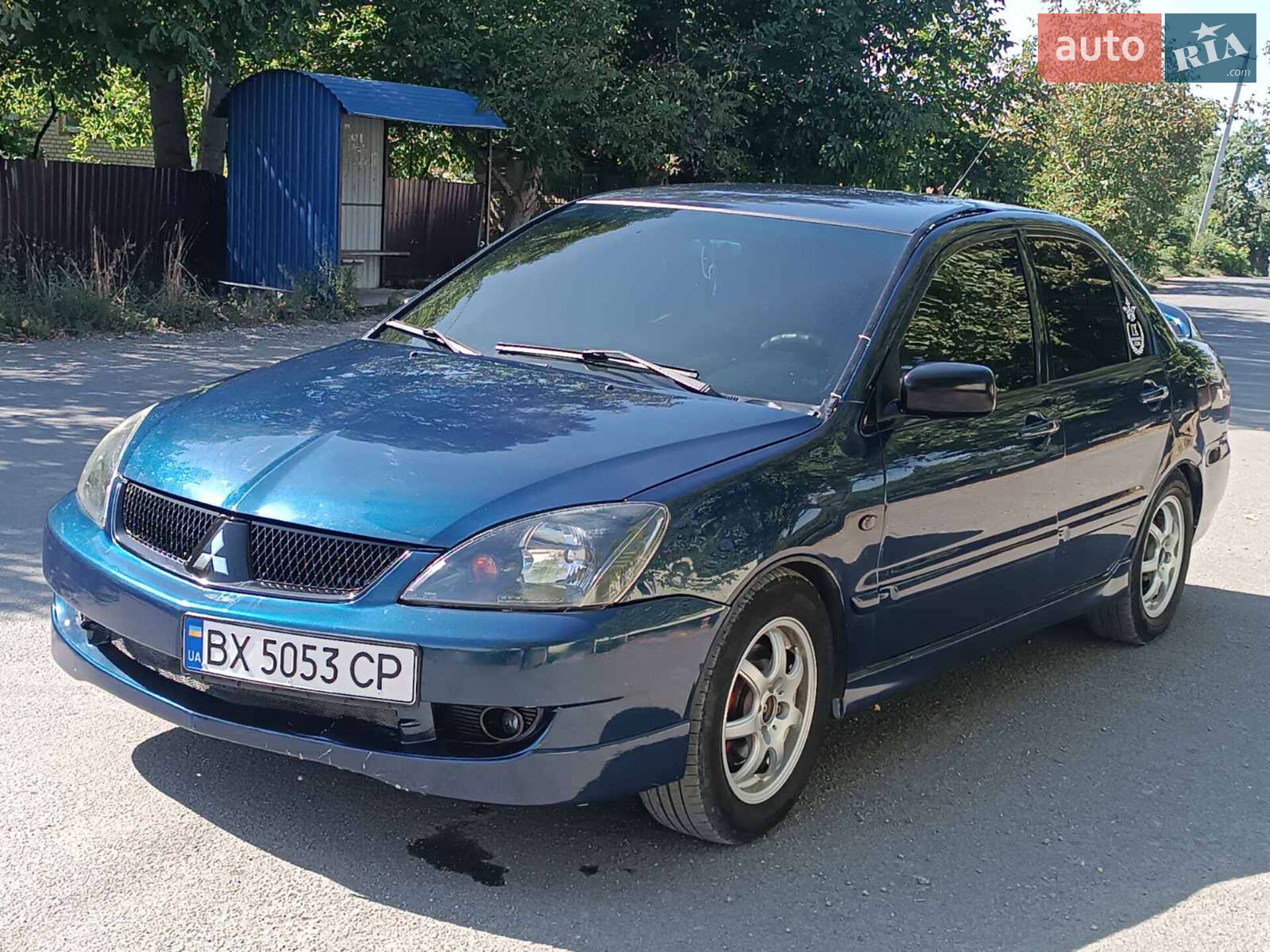 Головне фото звіту автомобіля MITSUBISHI LANCER 2006