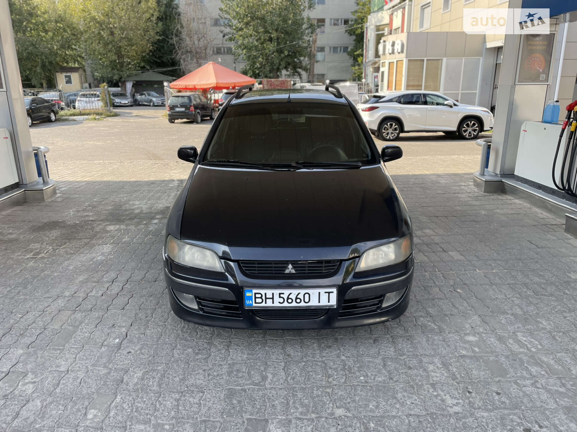 Головне фото звіту автомобіля MITSUBISHI SPACE STAR 2004