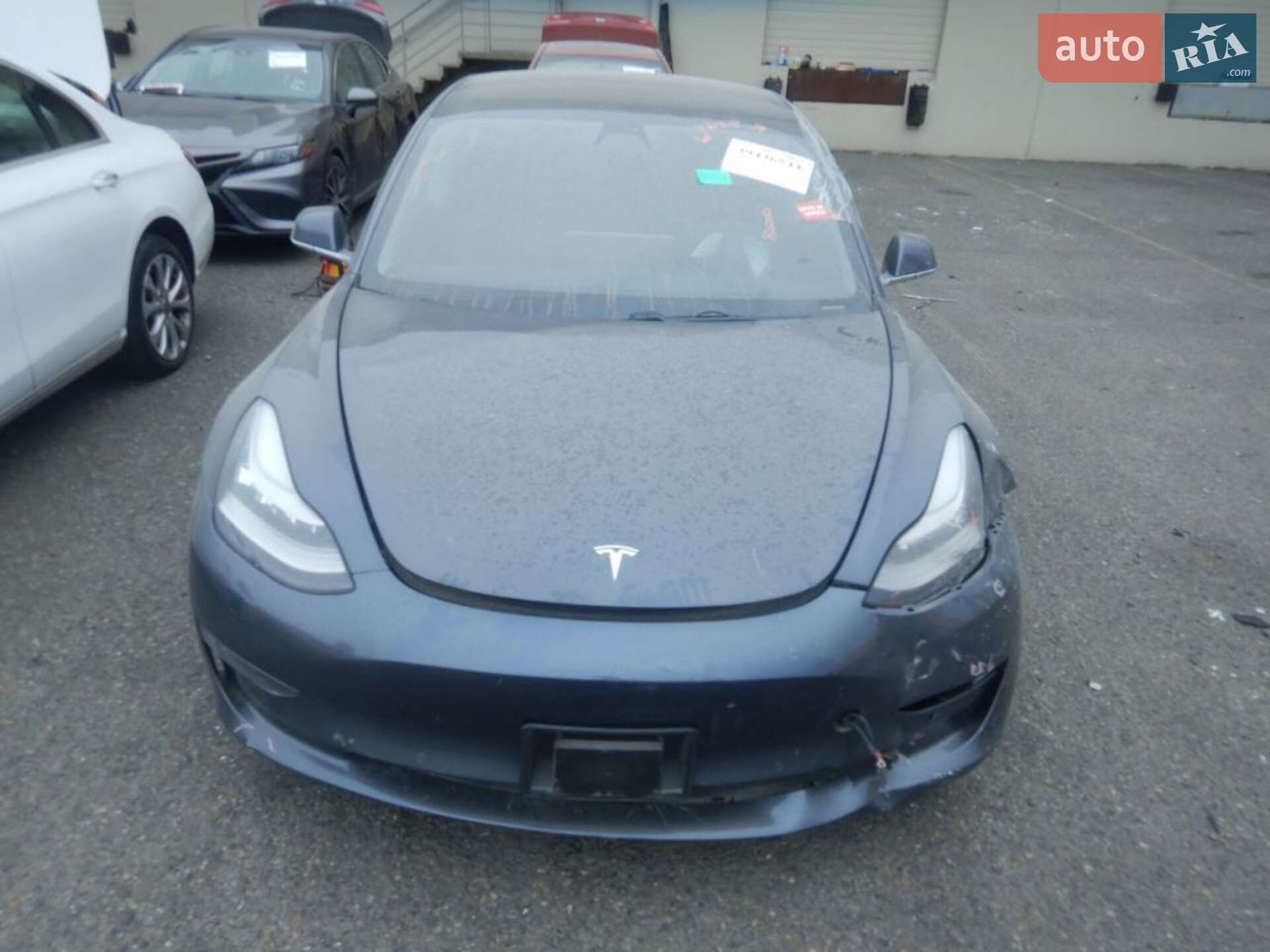 Головне фото звіту автомобіля TESLA MODEL 3 2018