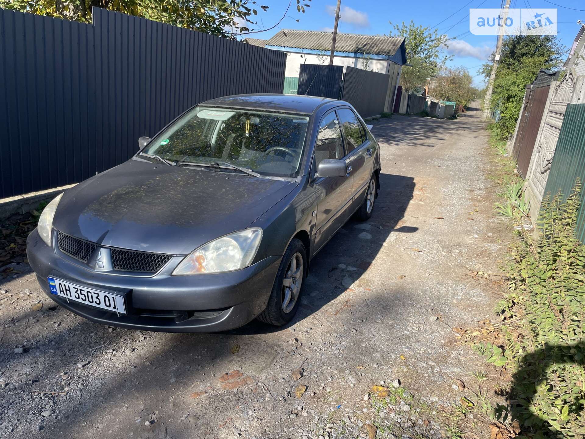 Головне фото звіту автомобіля MITSUBISHI LANCER 2005