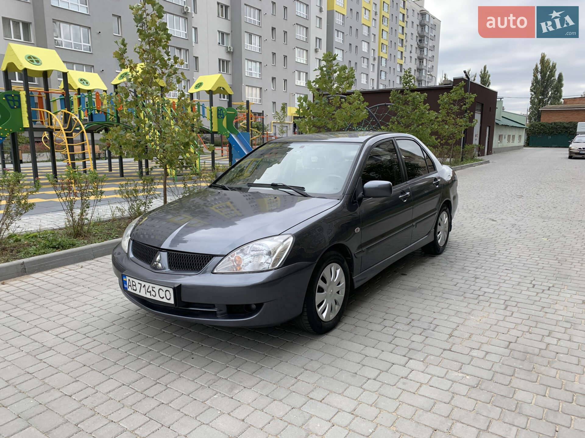 Головне фото звіту автомобіля MITSUBISHI LANCER 2006