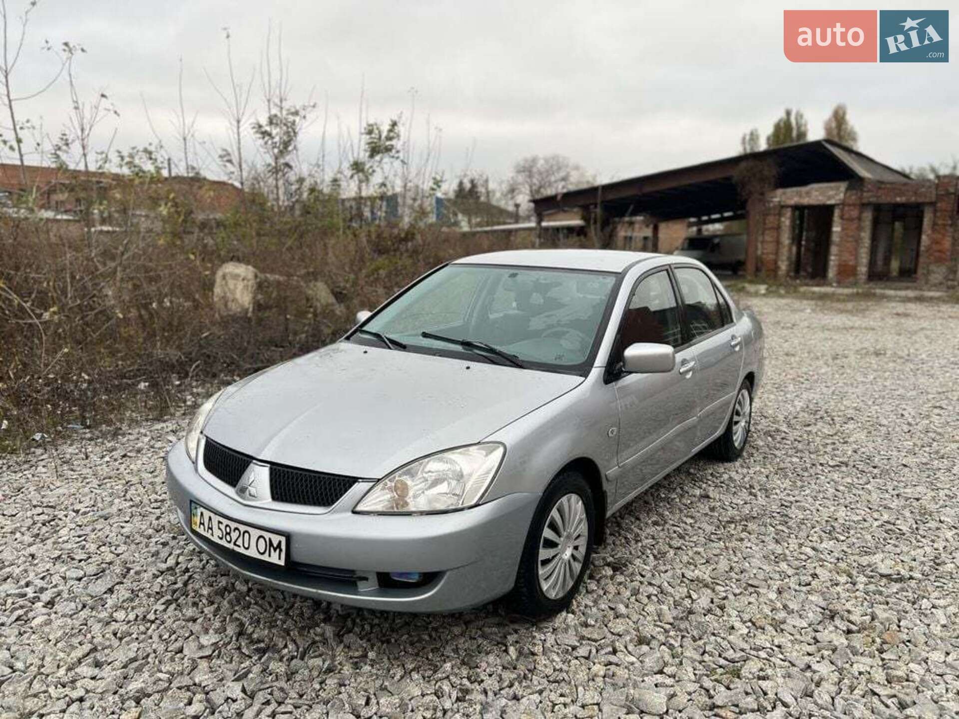 Головне фото звіту автомобіля MITSUBISHI LANCER 2006