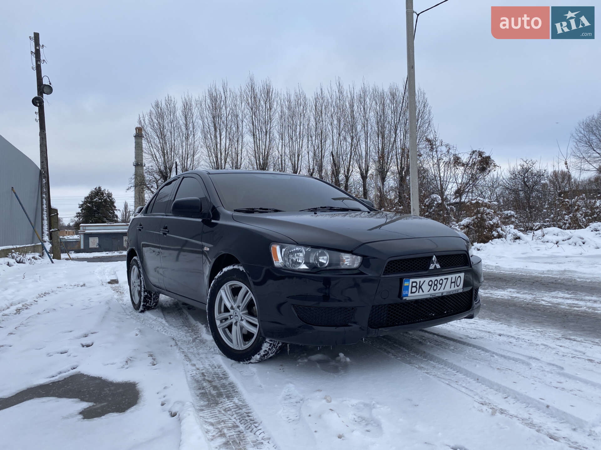 Головне фото звіту автомобіля MITSUBISHI LANCER 2007