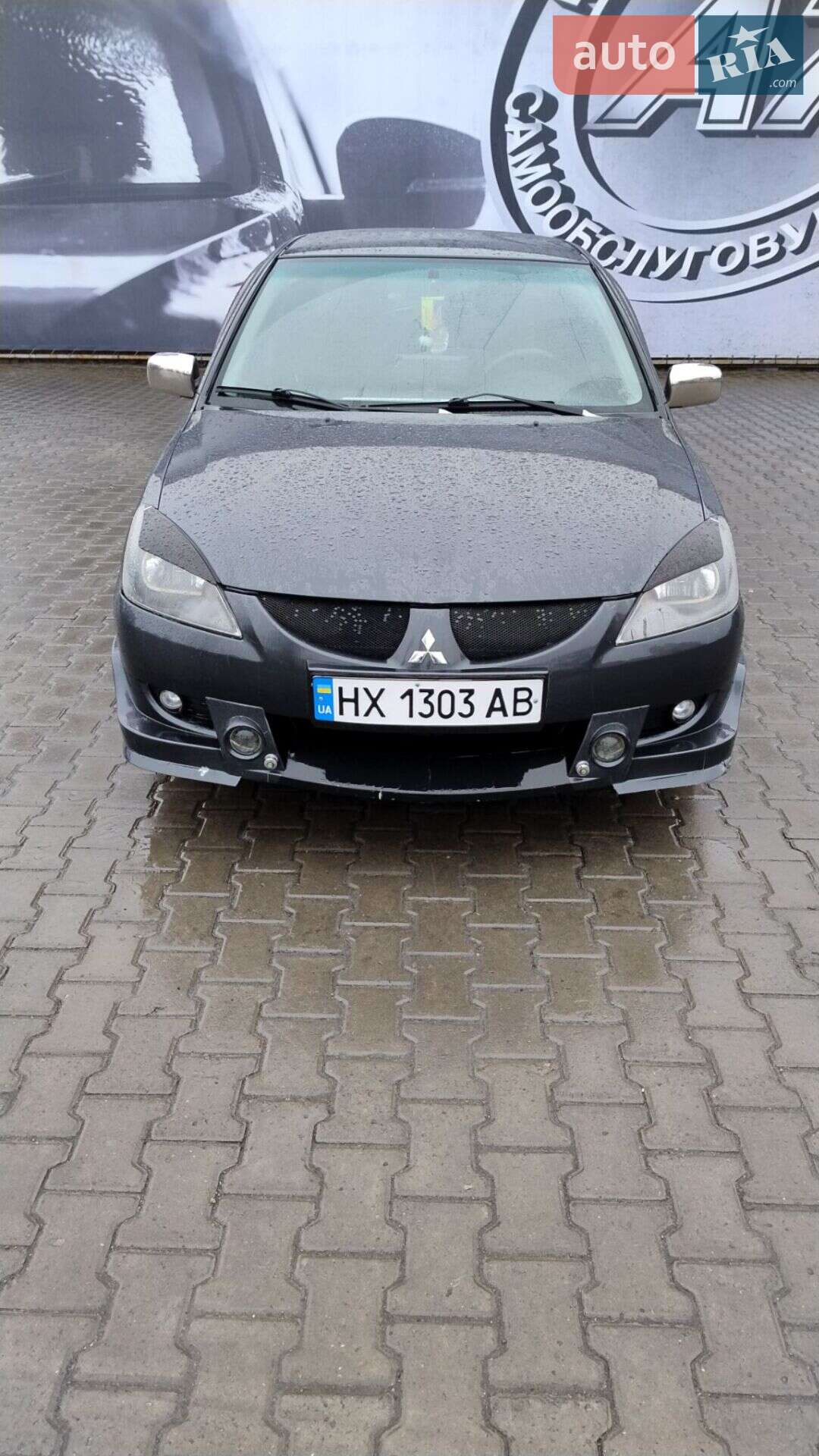 Головне фото звіту автомобіля MITSUBISHI LANCER 2004