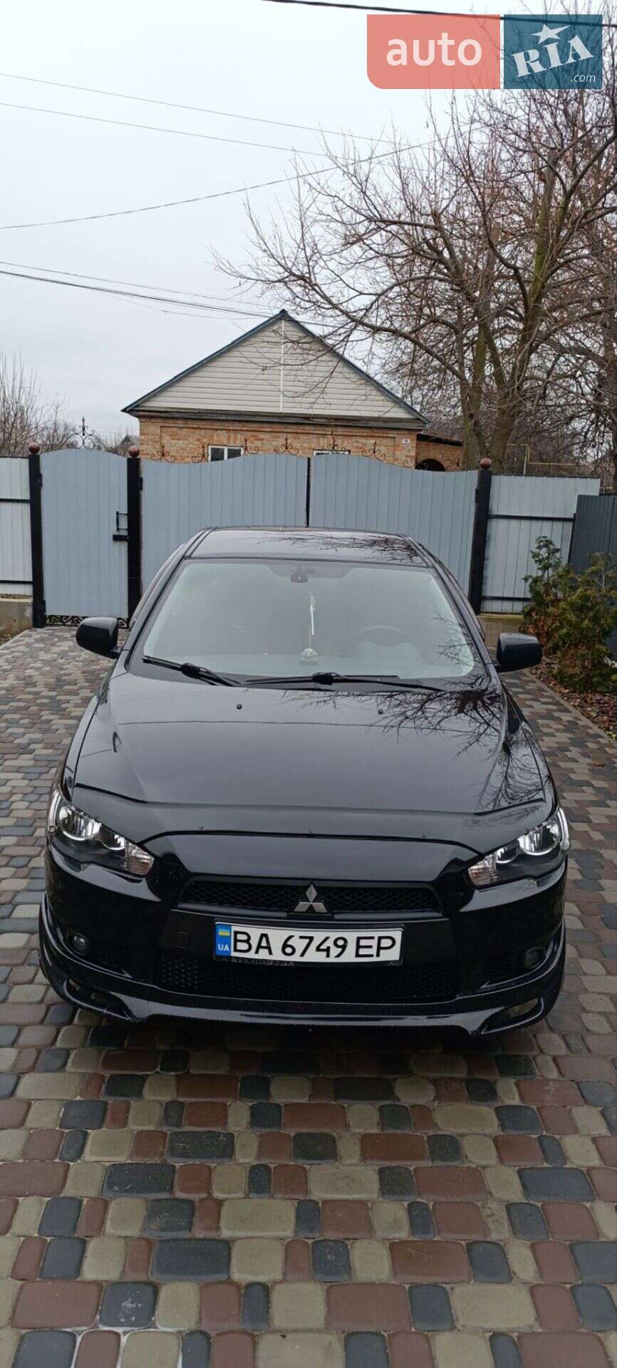 Головне фото звіту автомобіля MITSUBISHI LANCER 2011