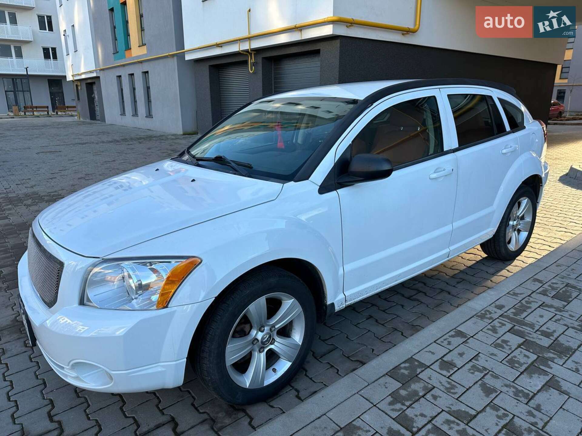 Головне фото звіту автомобіля DODGE CALIBER 2011