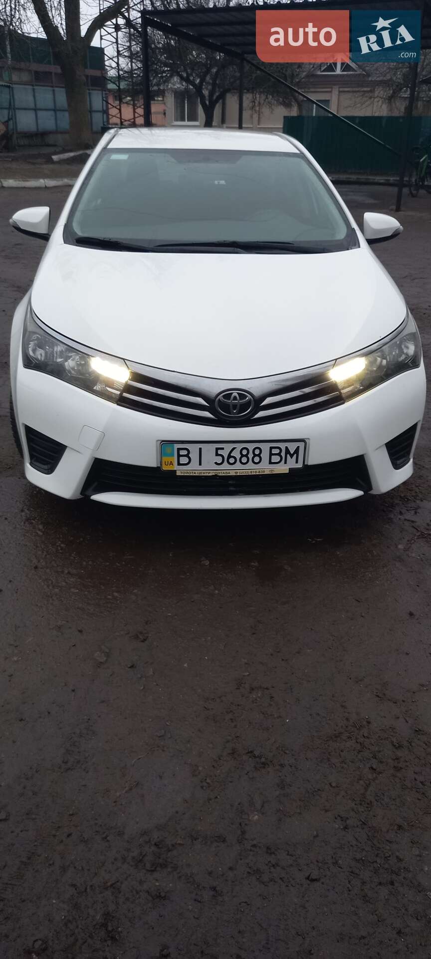 Головне фото звіту автомобіля TOYOTA COROLLA 2014