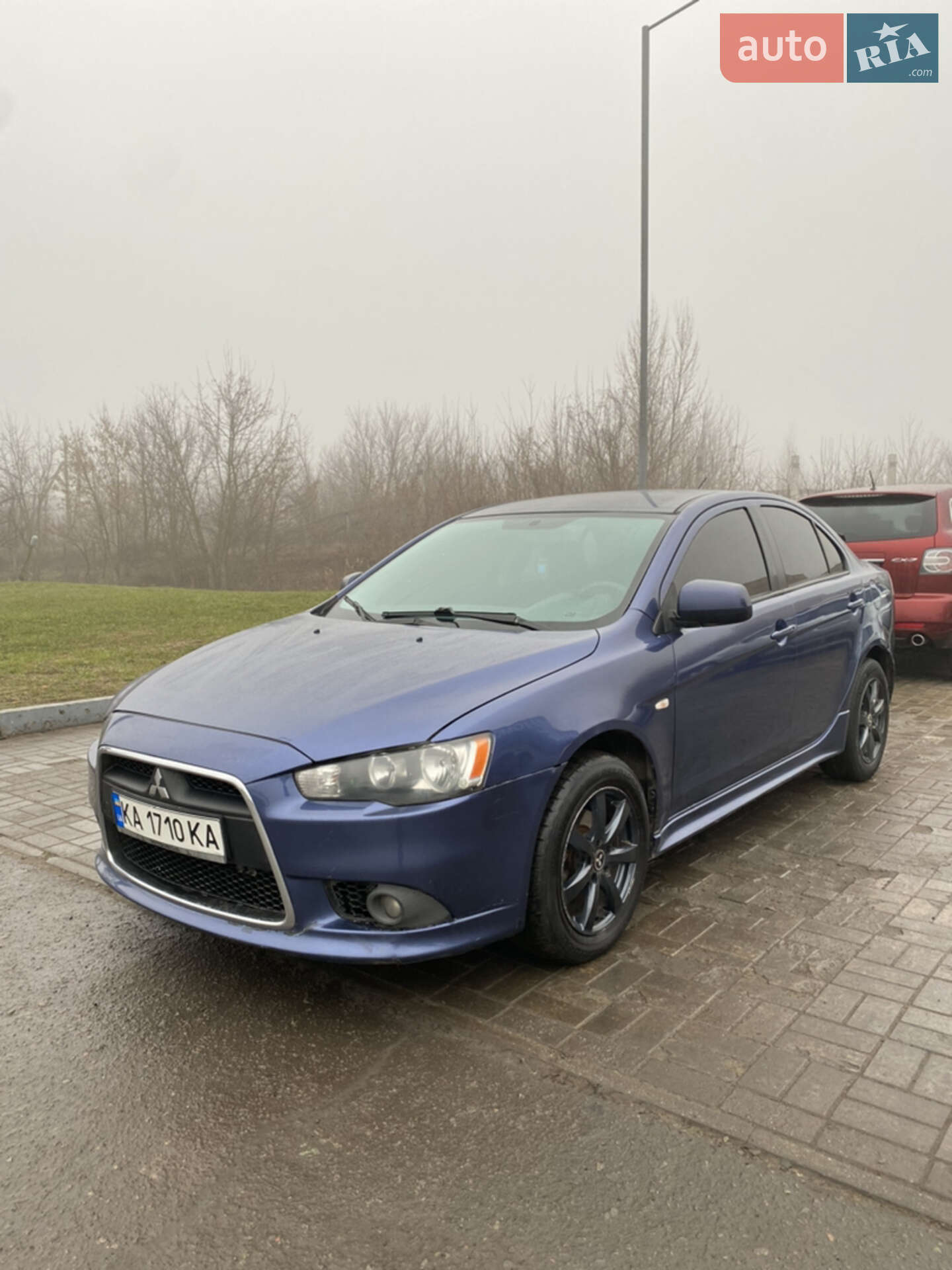 Головне фото звіту автомобіля MITSUBISHI LANCER 2008