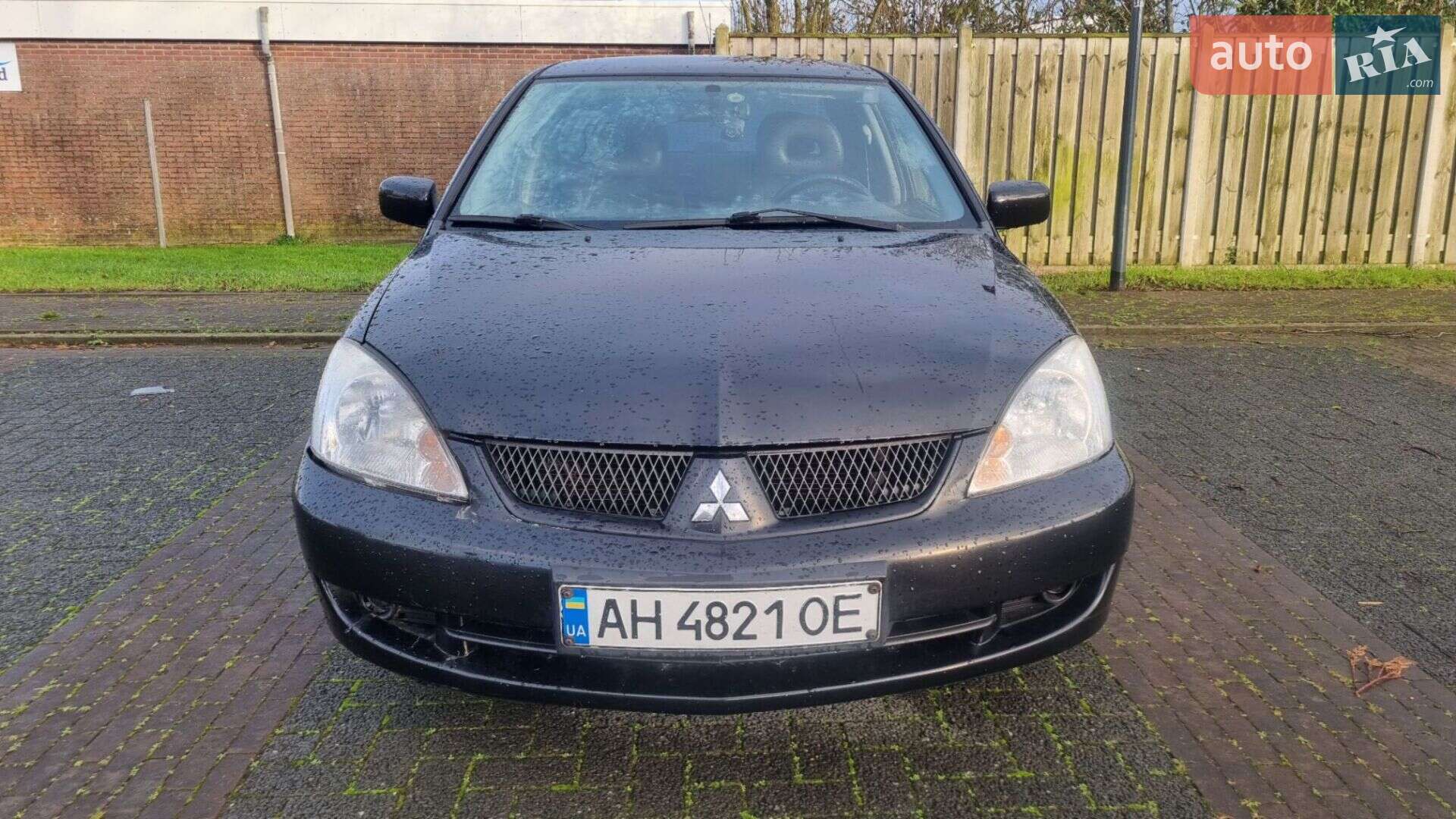Головне фото звіту автомобіля MITSUBISHI LANCER 2006