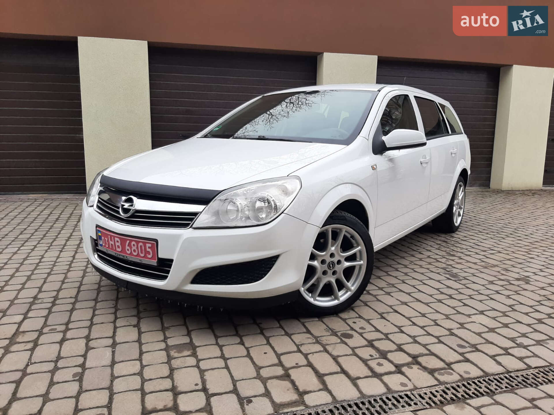 Головне фото звіту автомобіля OPEL ASTRA STATION WAGON 2009
