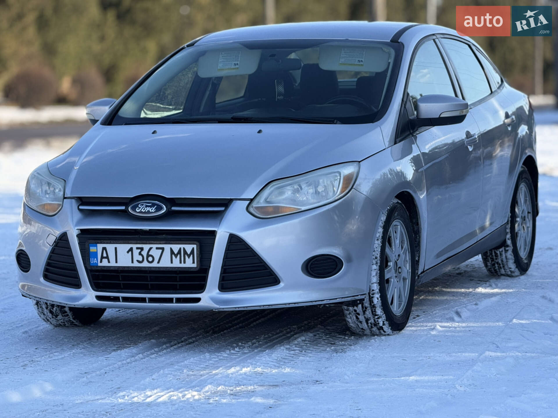 Головне фото звіту автомобіля FORD FOCUS 2012