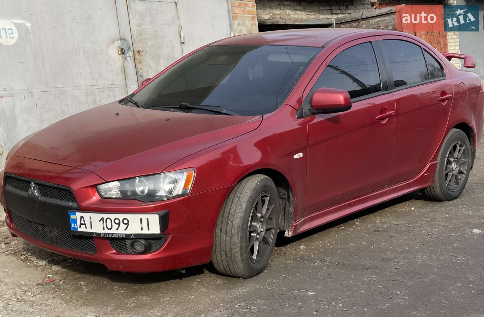 Головне фото звіту автомобіля MITSUBISHI LANCER 2007