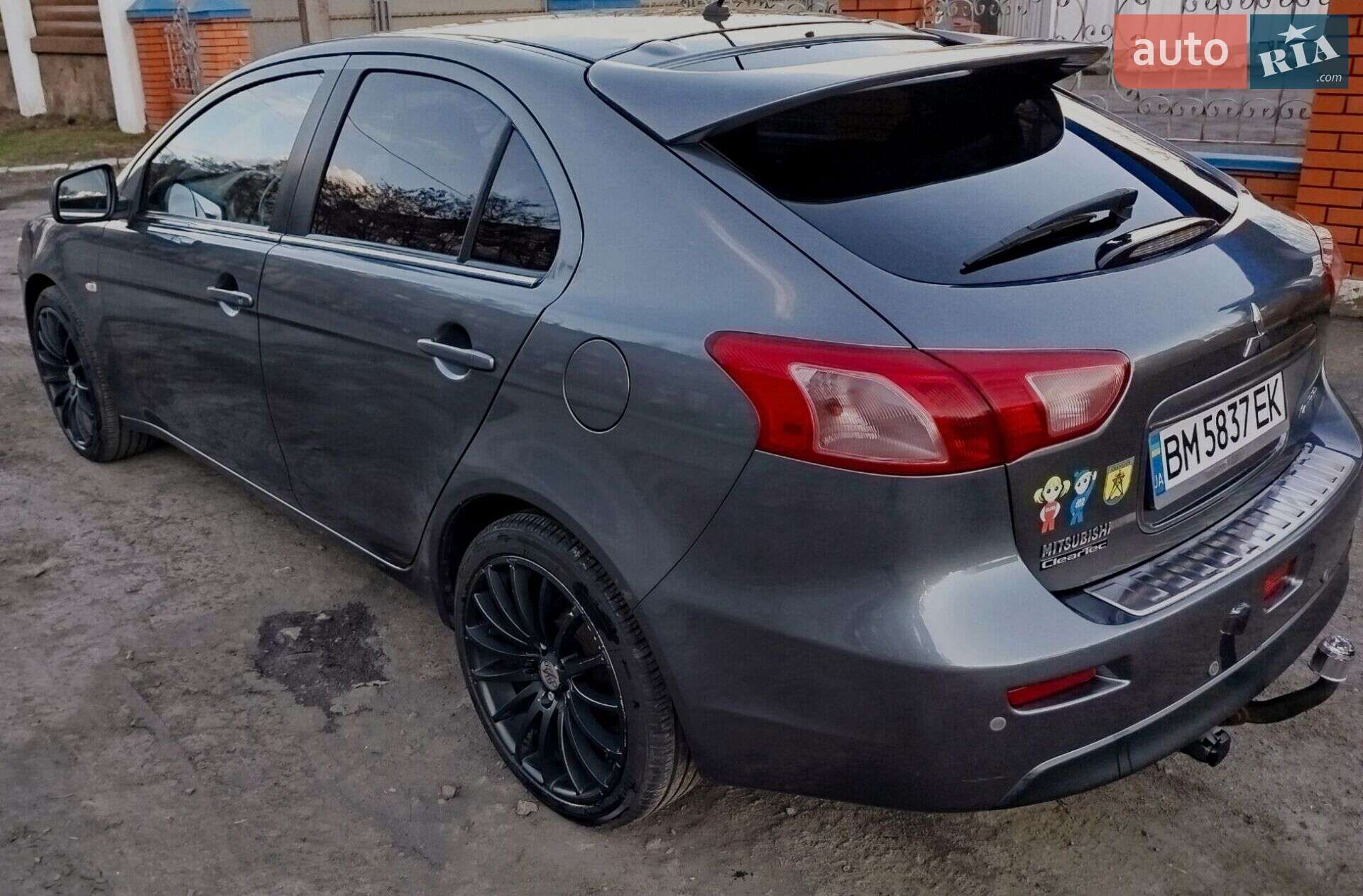 Головне фото звіту автомобіля MITSUBISHI LANCER 2010