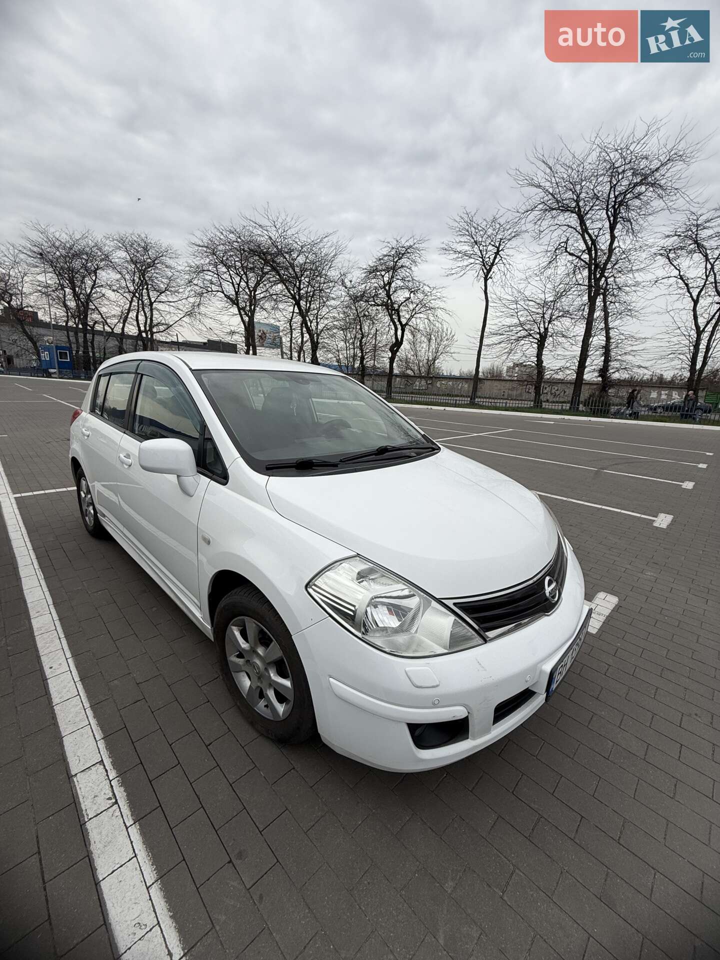 Головне фото звіту автомобіля NISSAN TIIDA 2012