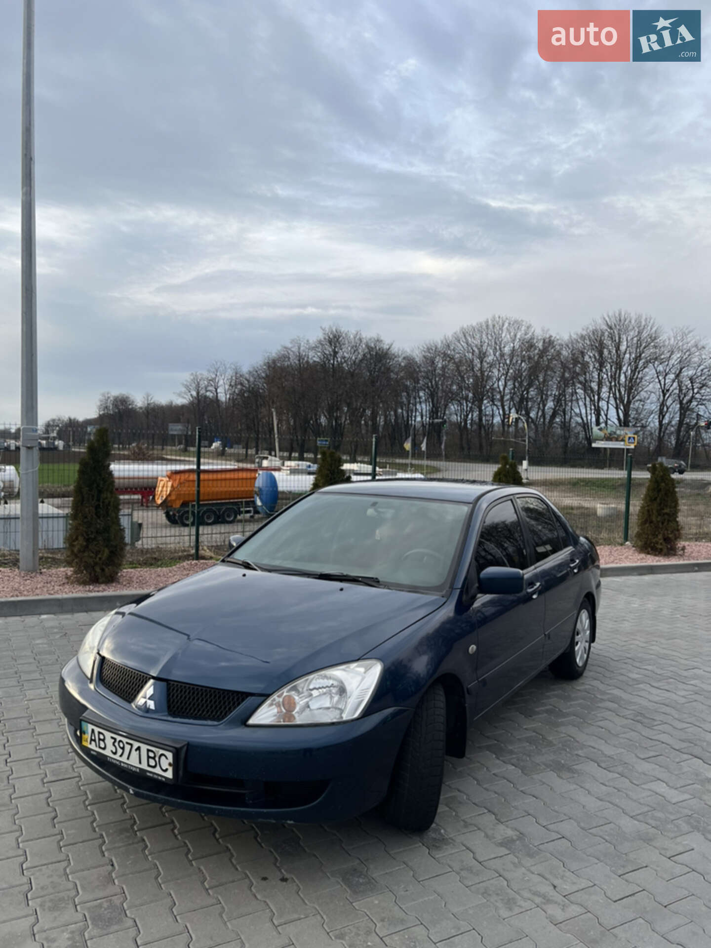 Головне фото звіту автомобіля MITSUBISHI LANCER 2006