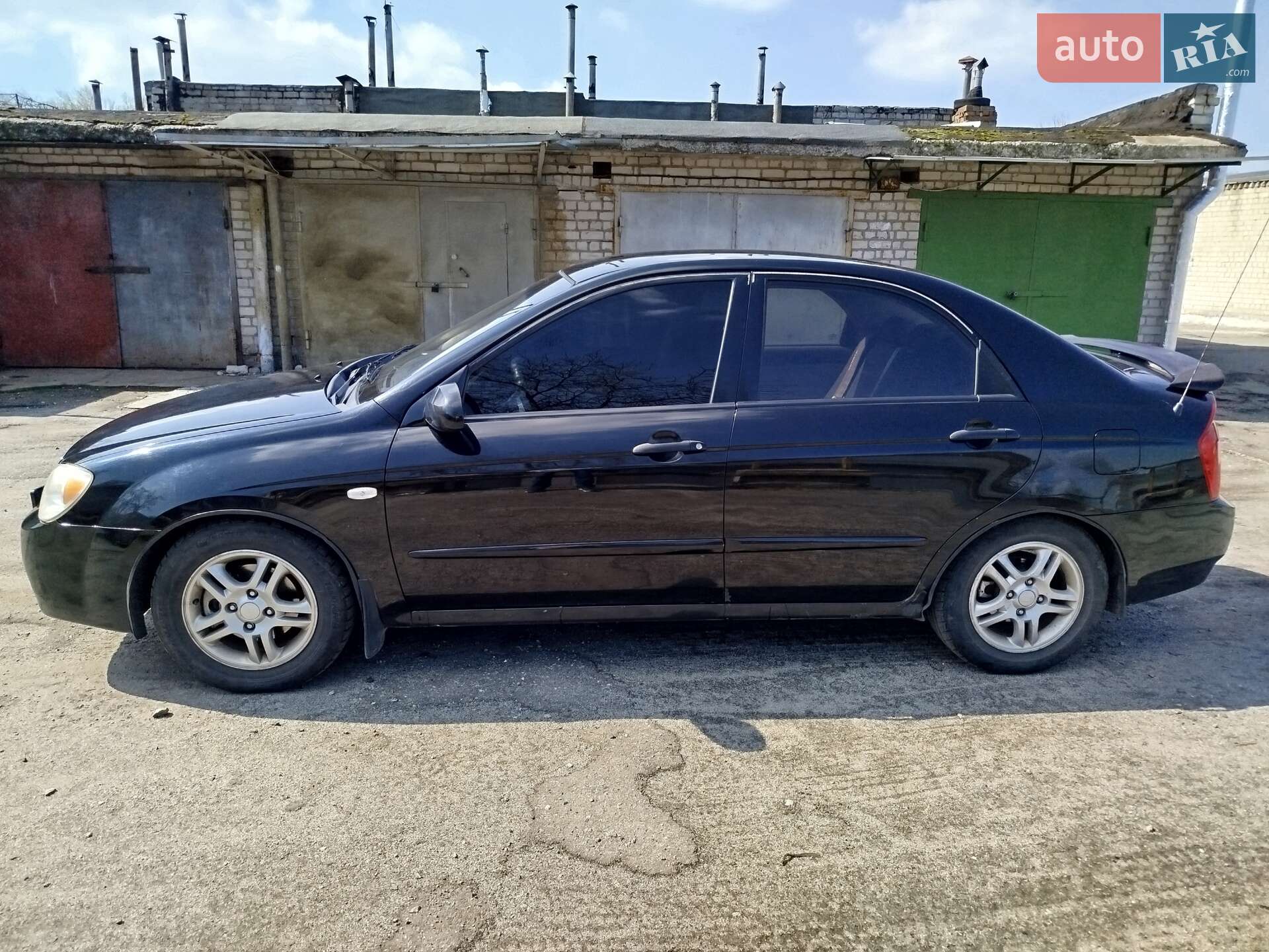 Головне фото звіту автомобіля KIA CERATO 2006
