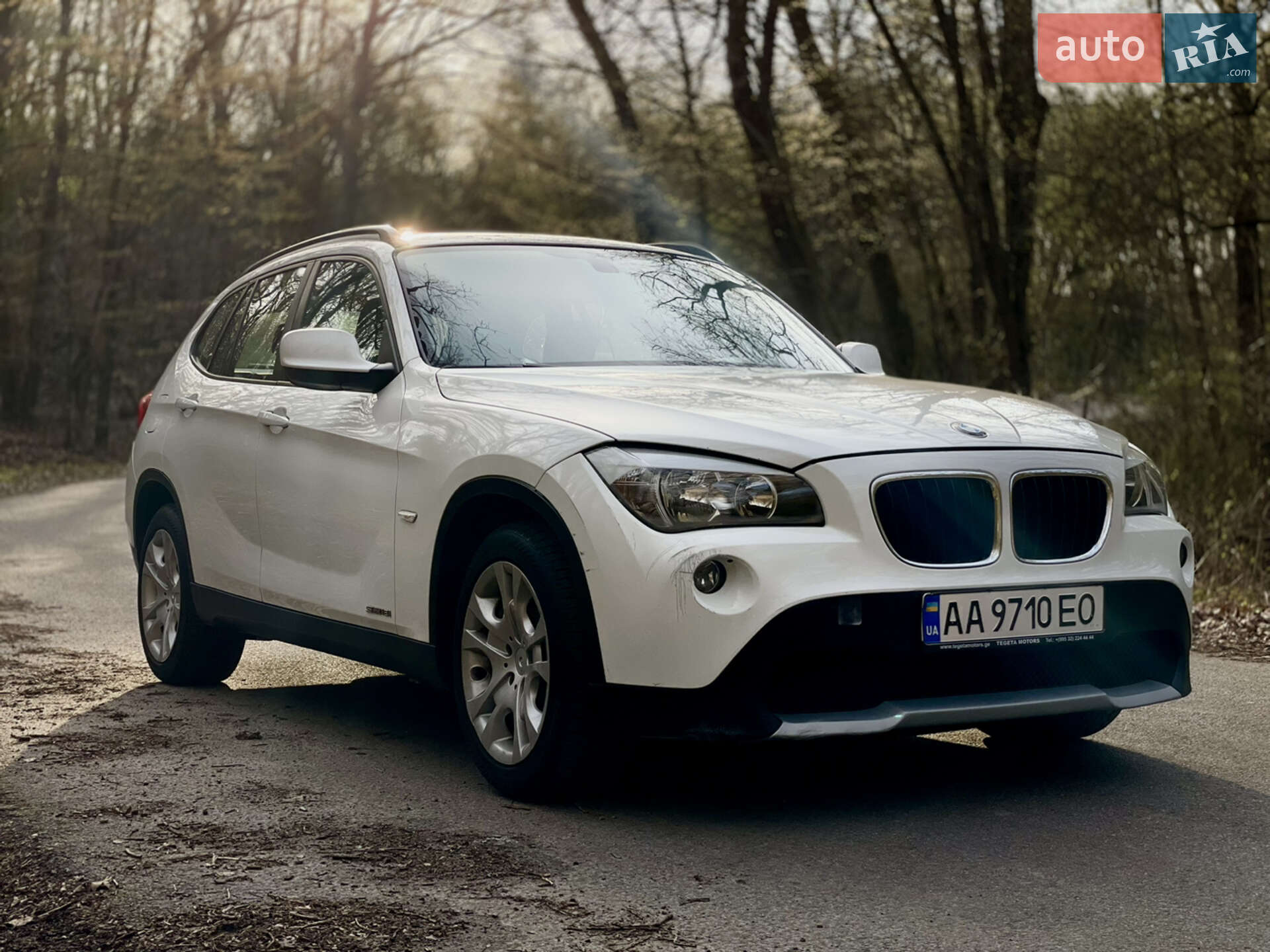 Головне фото звіту автомобіля BMW X1 2011