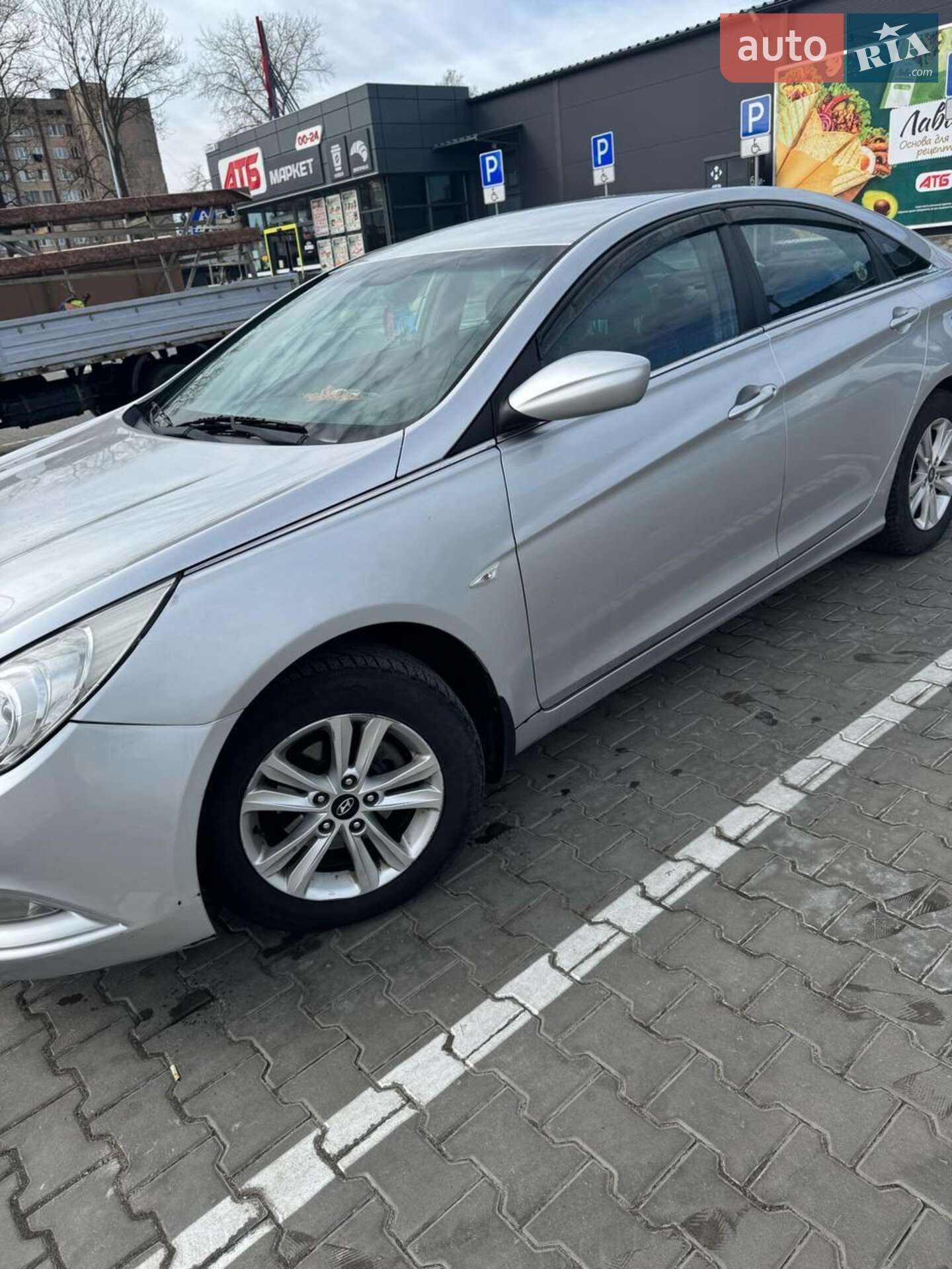 Головне фото звіту автомобіля HYUNDAI SONATA 2009