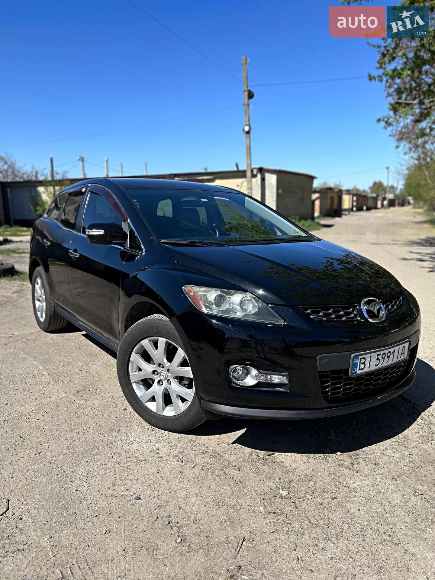 Головне фото звіту автомобіля MAZDA CX-7 2008