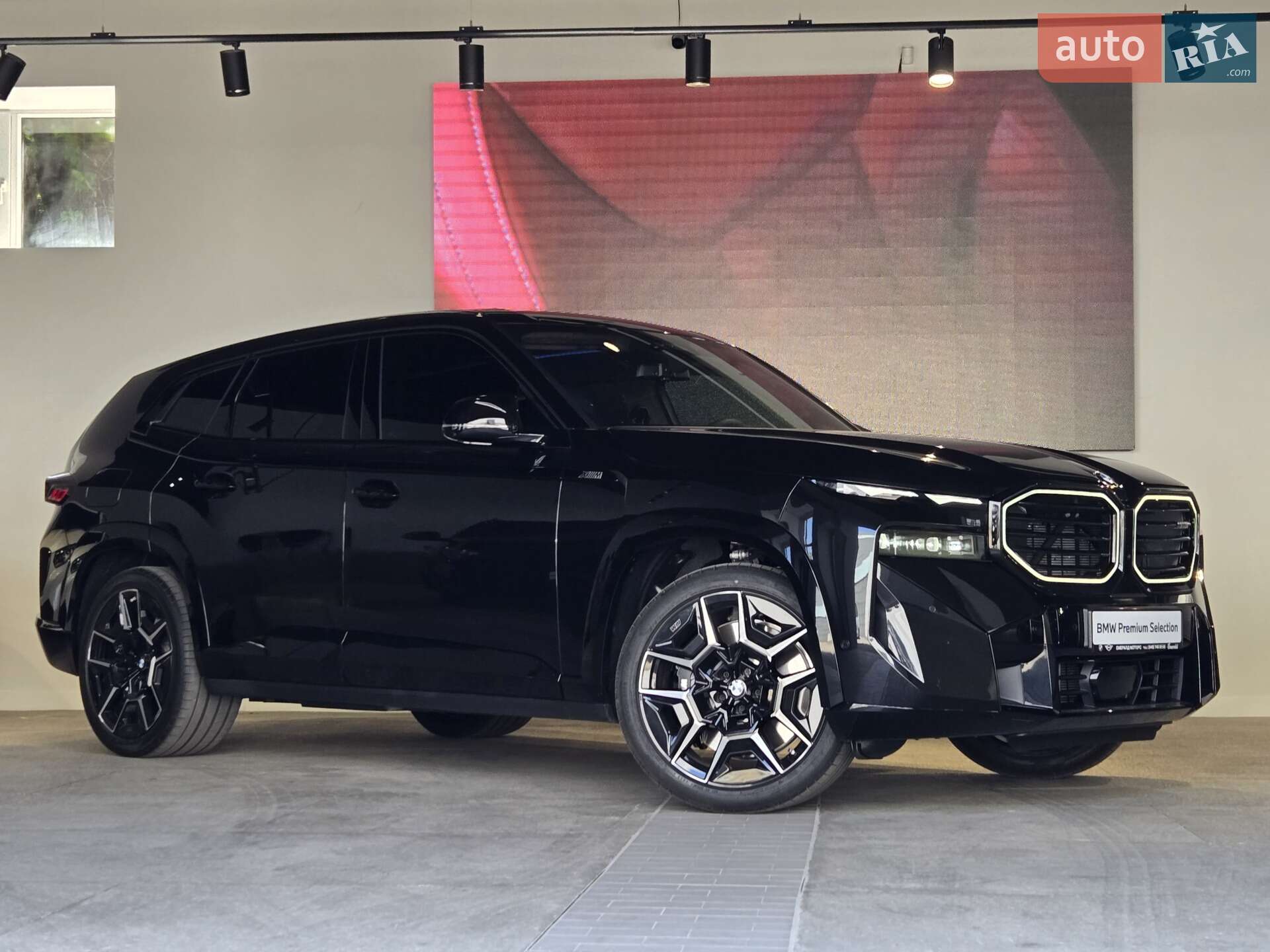 Головне фото звіту автомобіля BMW XM 2024