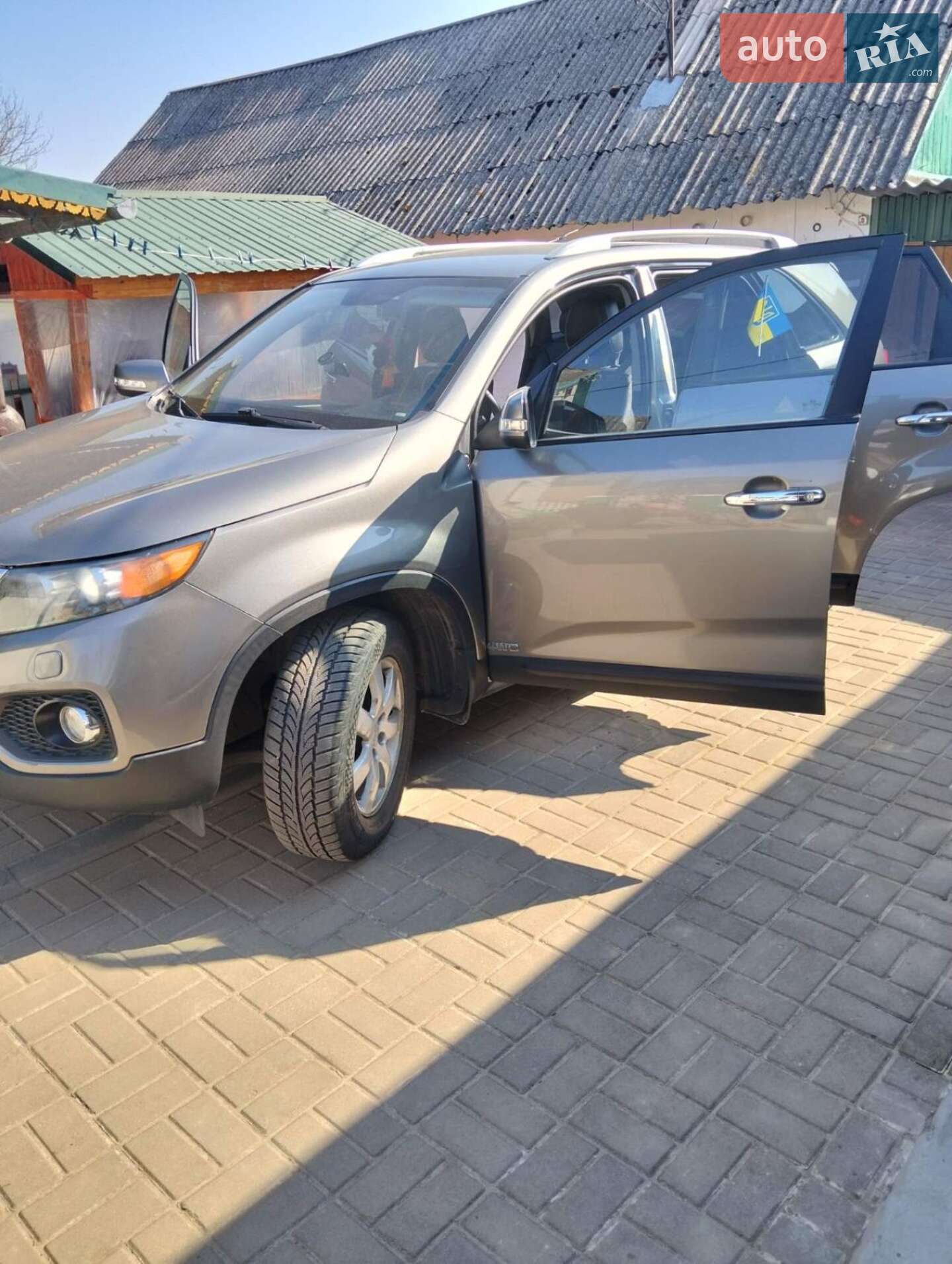 Головне фото звіту автомобіля KIA SORENTO 2010