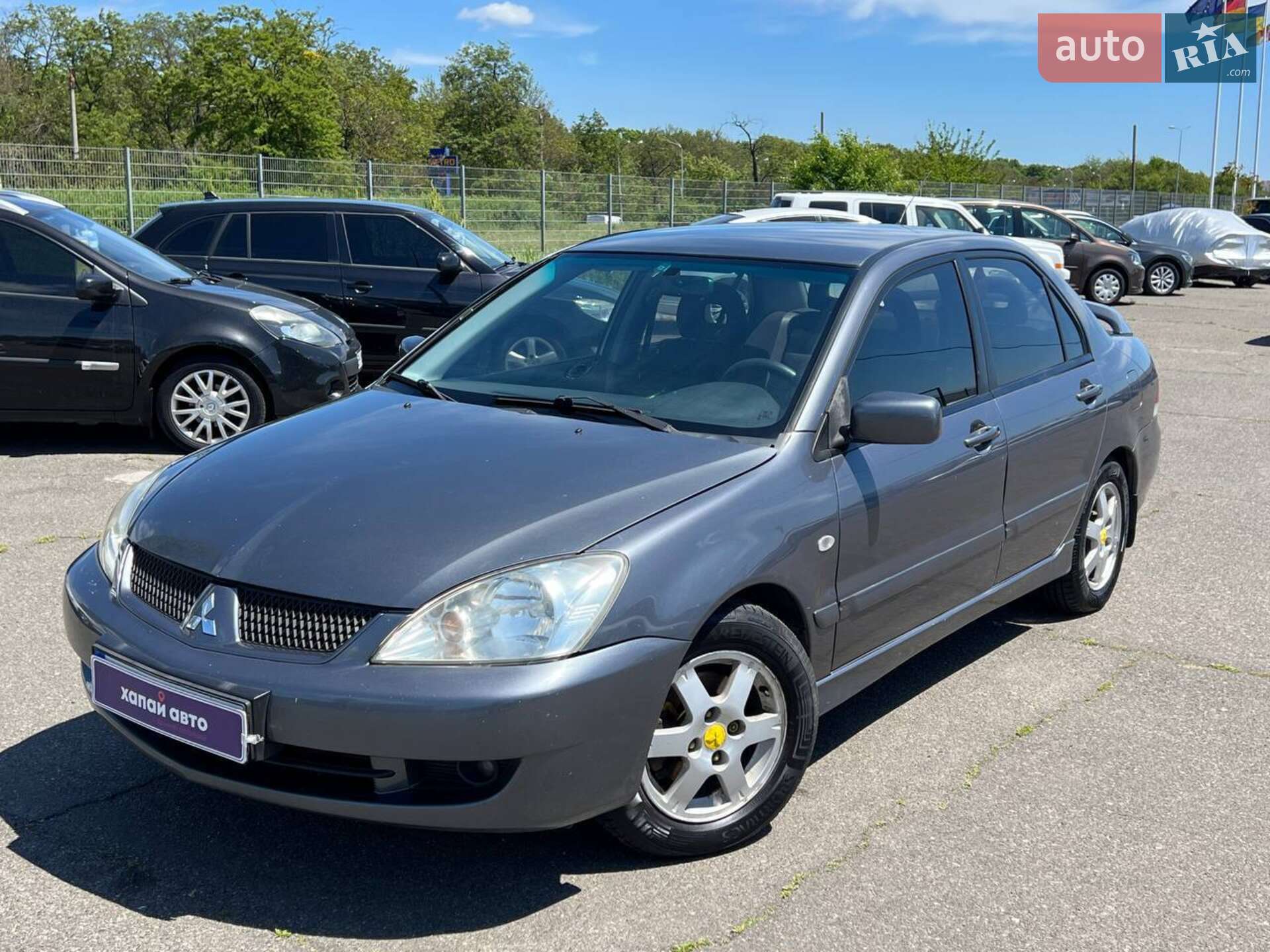 Головне фото звіту автомобіля MITSUBISHI LANCER 2006