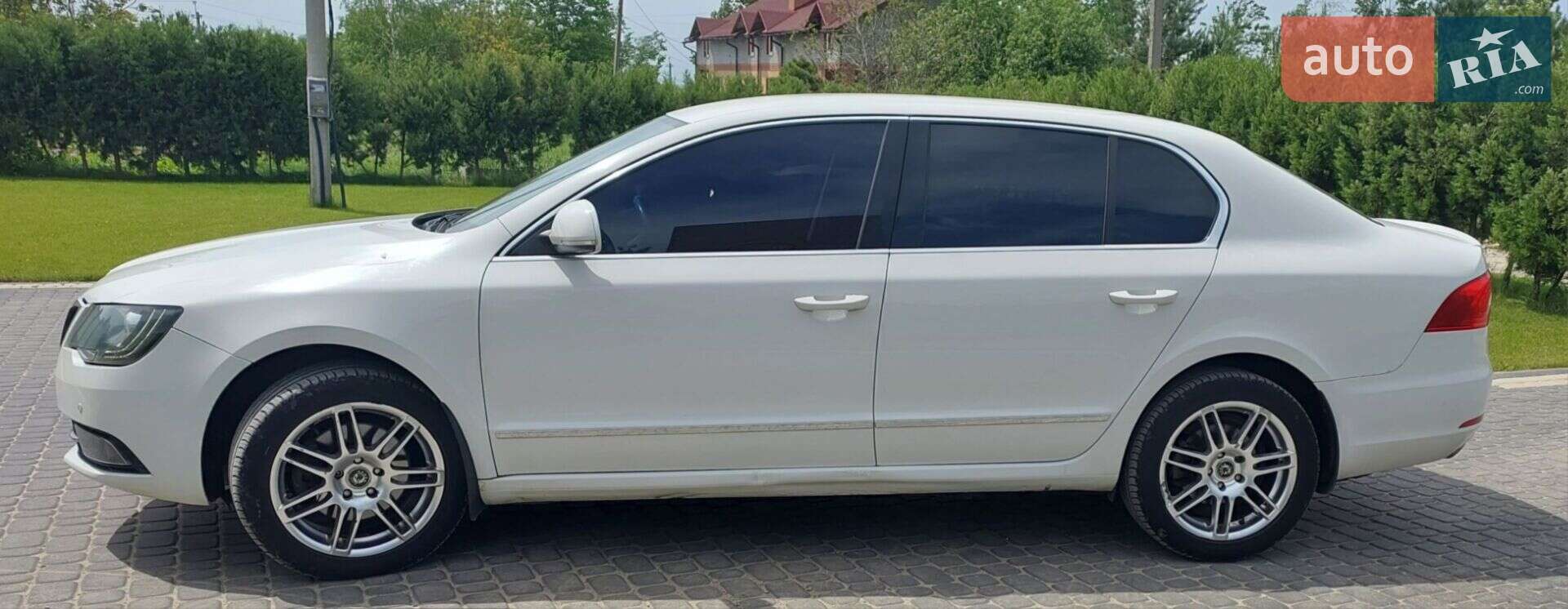 Головне фото звіту автомобіля SKODA SUPERB 2013