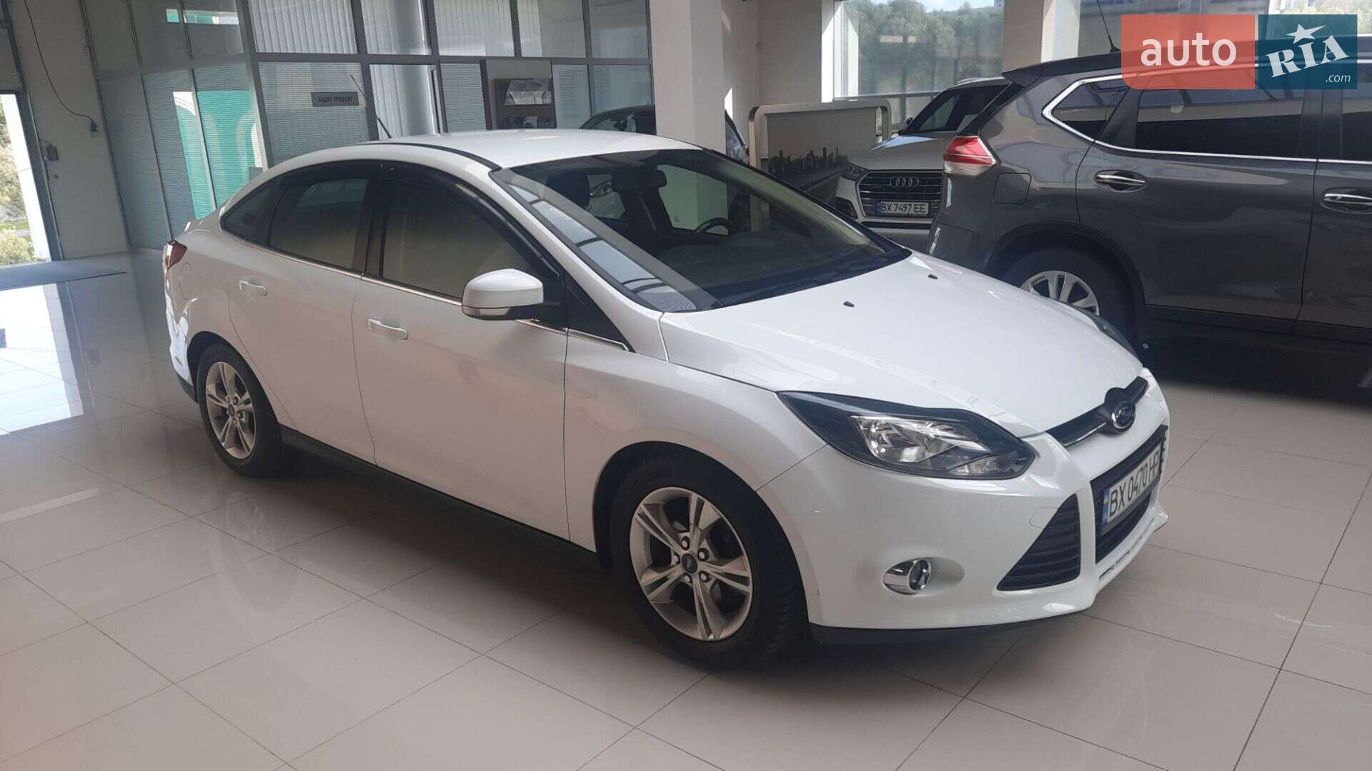 Головне фото звіту автомобіля FORD FOCUS 2013