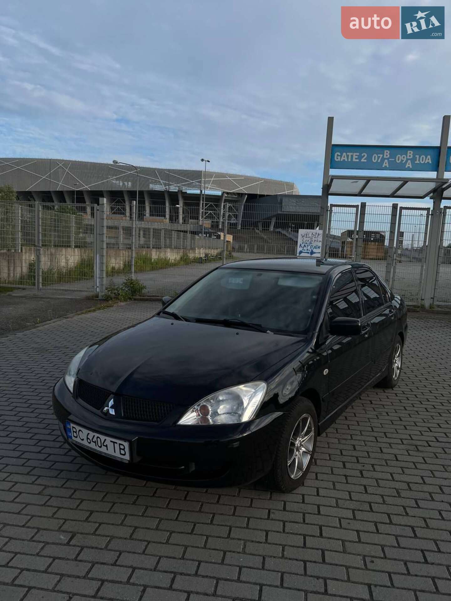 Головне фото звіту автомобіля MITSUBISHI LANCER 2006