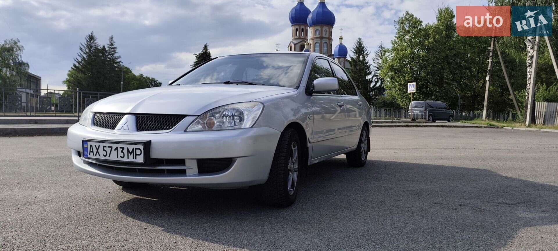 Головне фото звіту автомобіля MITSUBISHI LANCER 2006