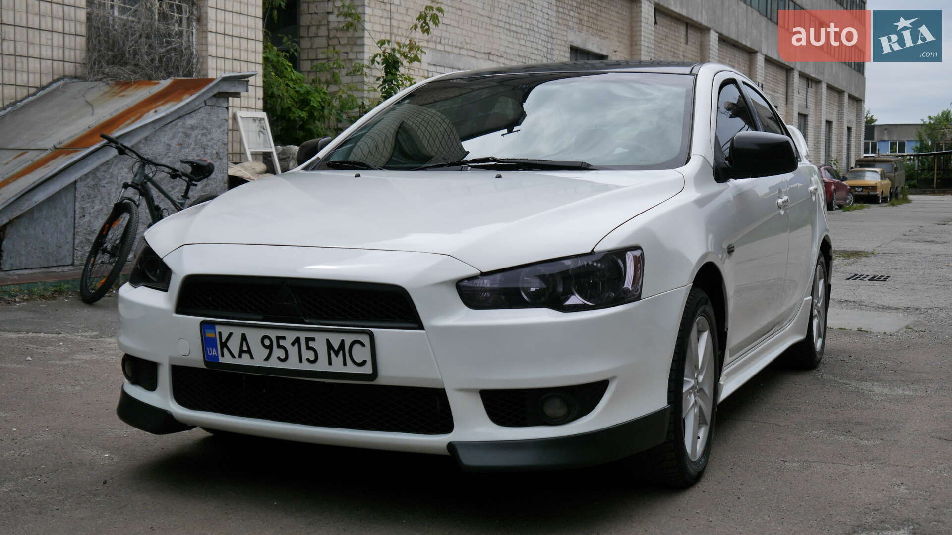 Головне фото звіту автомобіля MITSUBISHI LANCER 2010