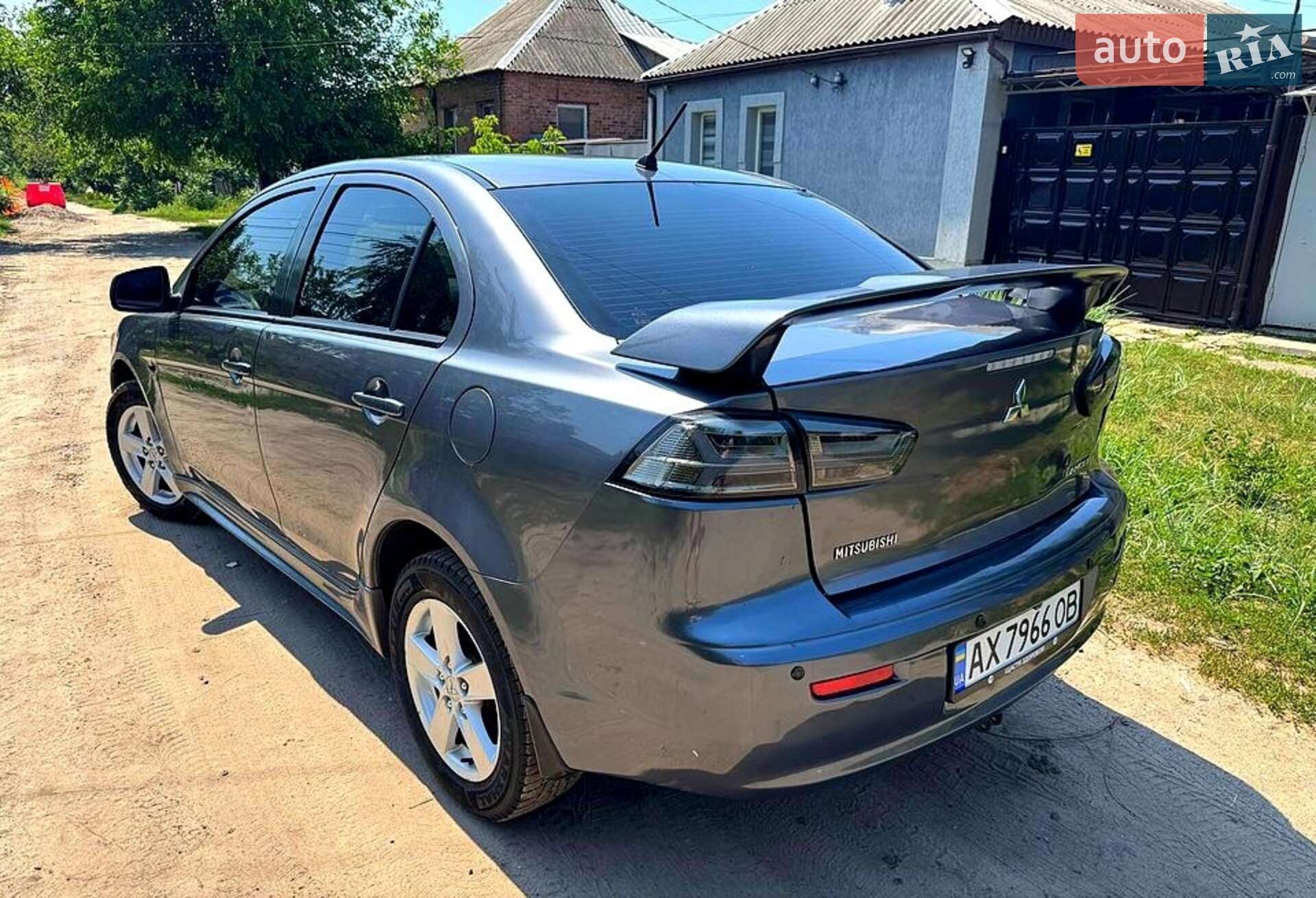 Головне фото звіту автомобіля MITSUBISHI LANCER 2009
