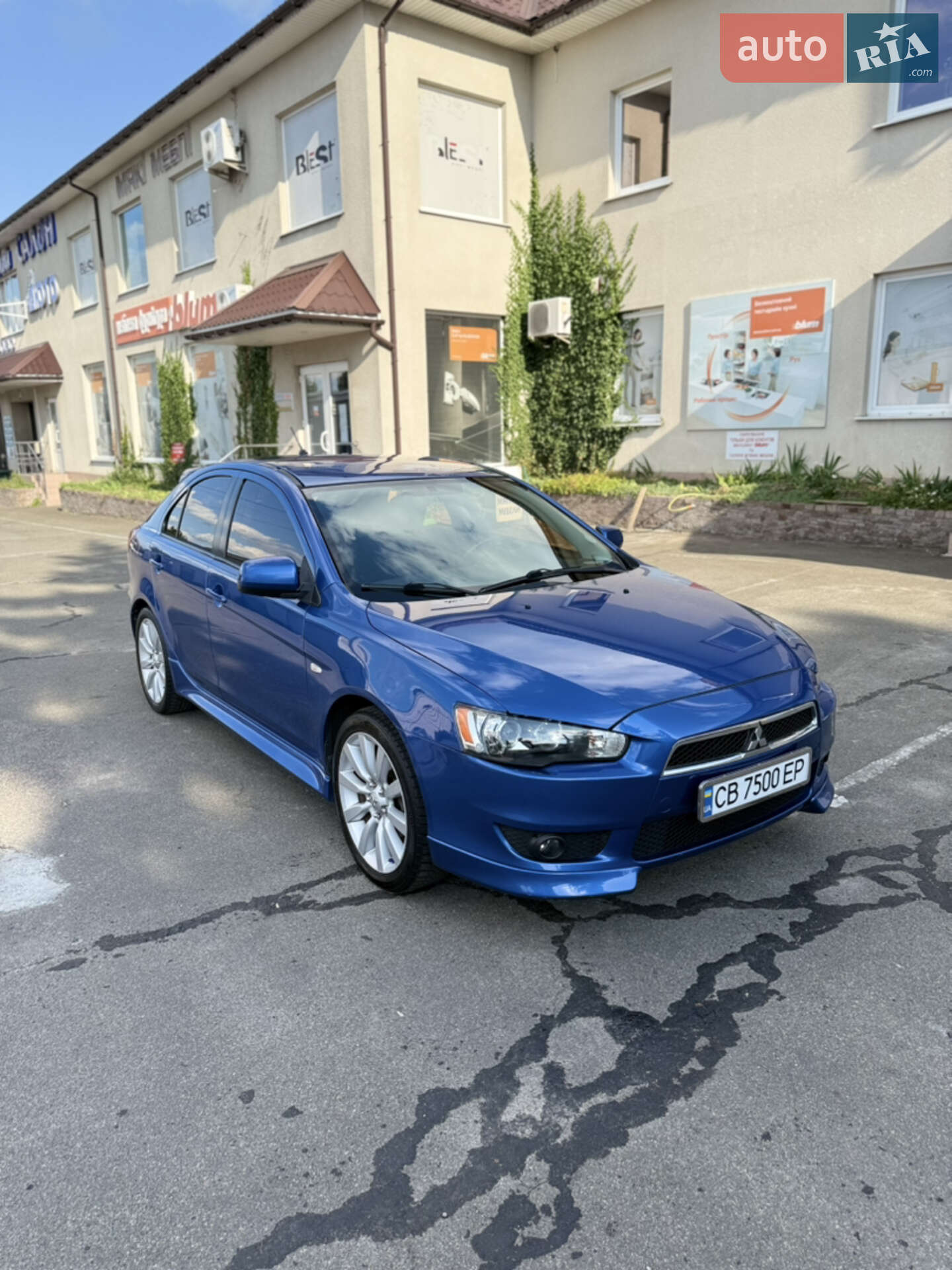 Головне фото звіту автомобіля MITSUBISHI LANCER 2009
